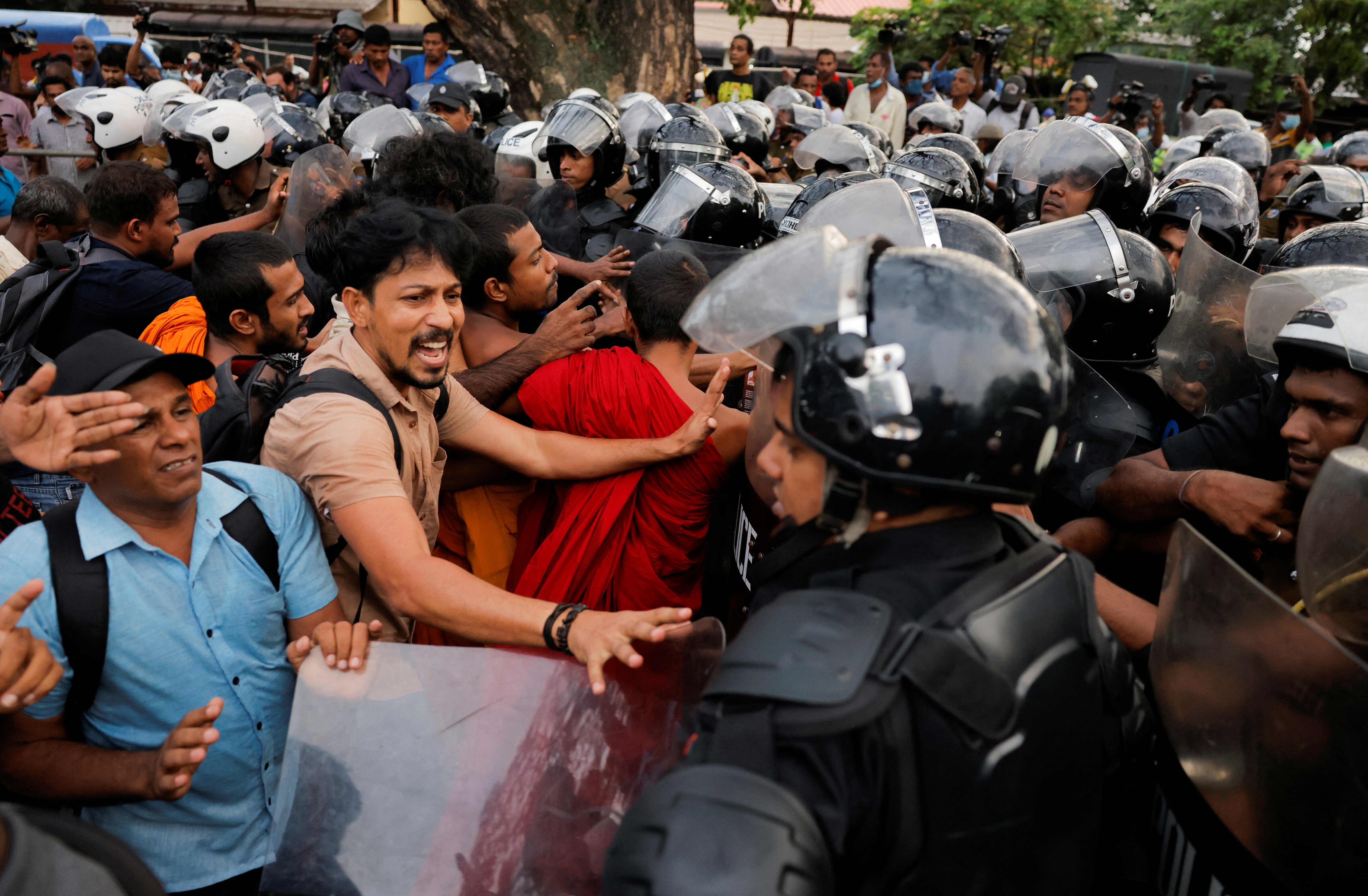 Demonstrators shout at Sri Lankan police officers during an anti-government protest by trade unions, student movements, and civil organisations, including the main opposition parties, amid the country's economic crisis, in Colombo, Sri Lanka, November 2, 2022. REUTERS/ Dinuka Liyanawatte