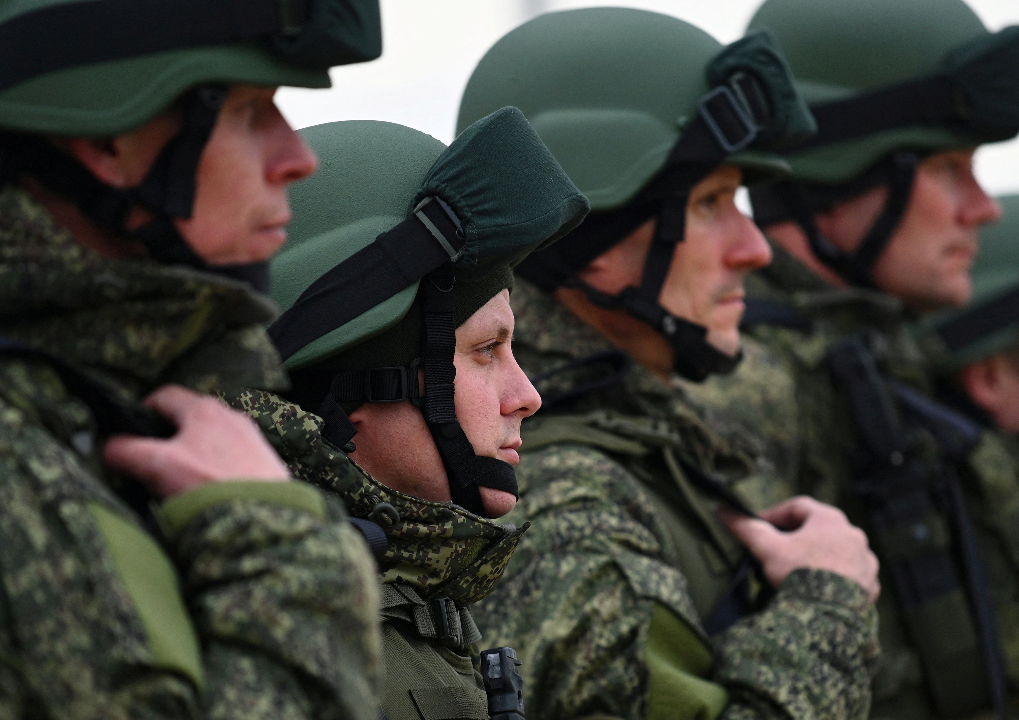Russian reservists recruited during the partial mobilisation of troops attend a ceremony before departing to the zone of Russia-Ukraine conflict, in the Rostov region, Russia October 31, 2022. REUTERS/Sergey Pivovarov