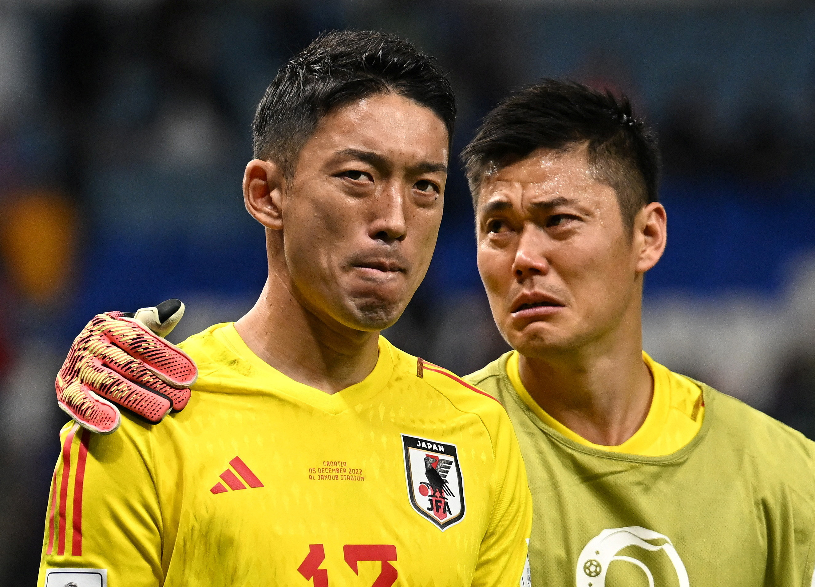 Soccer Football - FIFA World Cup Qatar 2022 - Round of 16 - Japan v Croatia - Al Janoub Stadium, Al Wakrah, Qatar - December 5, 2022 Japan's Shuichi Gonda and Eiji Kawashima look dejected after the penalty shootout as Japan are eliminated from the World Cup REUTERS/Dylan Martinez TPX IMAGES OF THE DAY