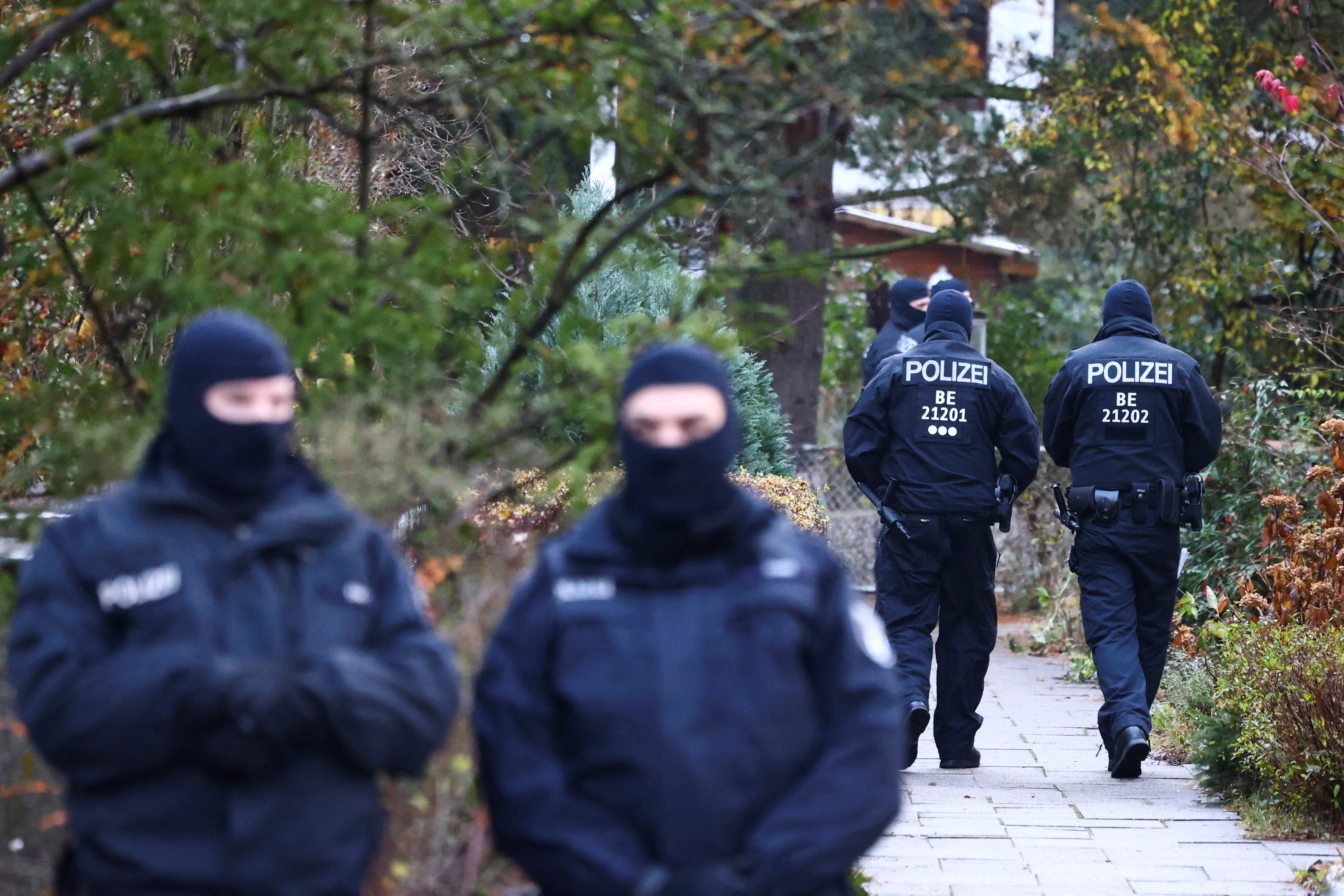 Police secures the area after 25 suspected members and supporters of a far-right group were detained during raids across Germany, in Berlin, Germany December 7, 2022. REUTERS/Christian Mang