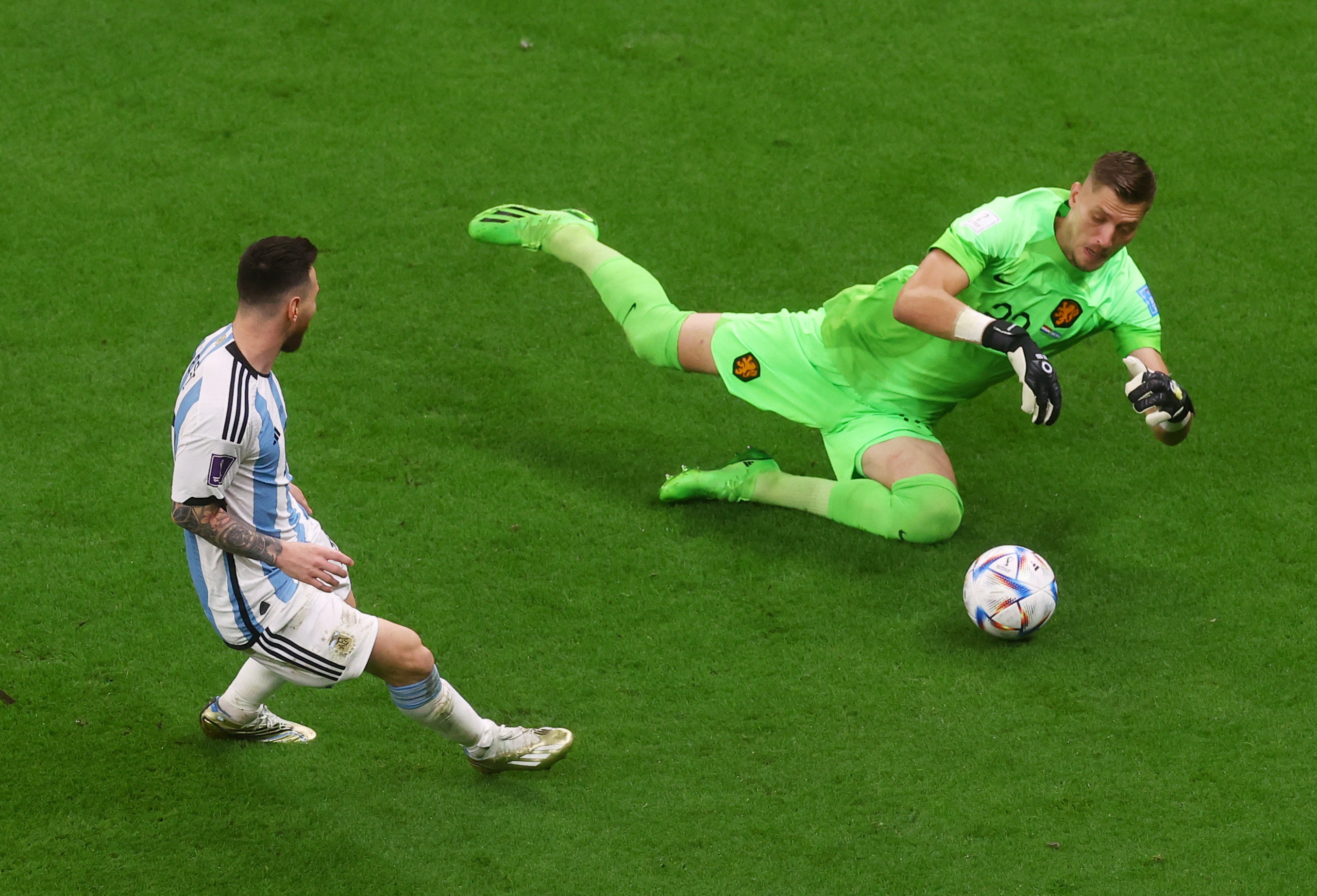 Argentina's Lionel Messi in action with Netherlands's Andries Noppert