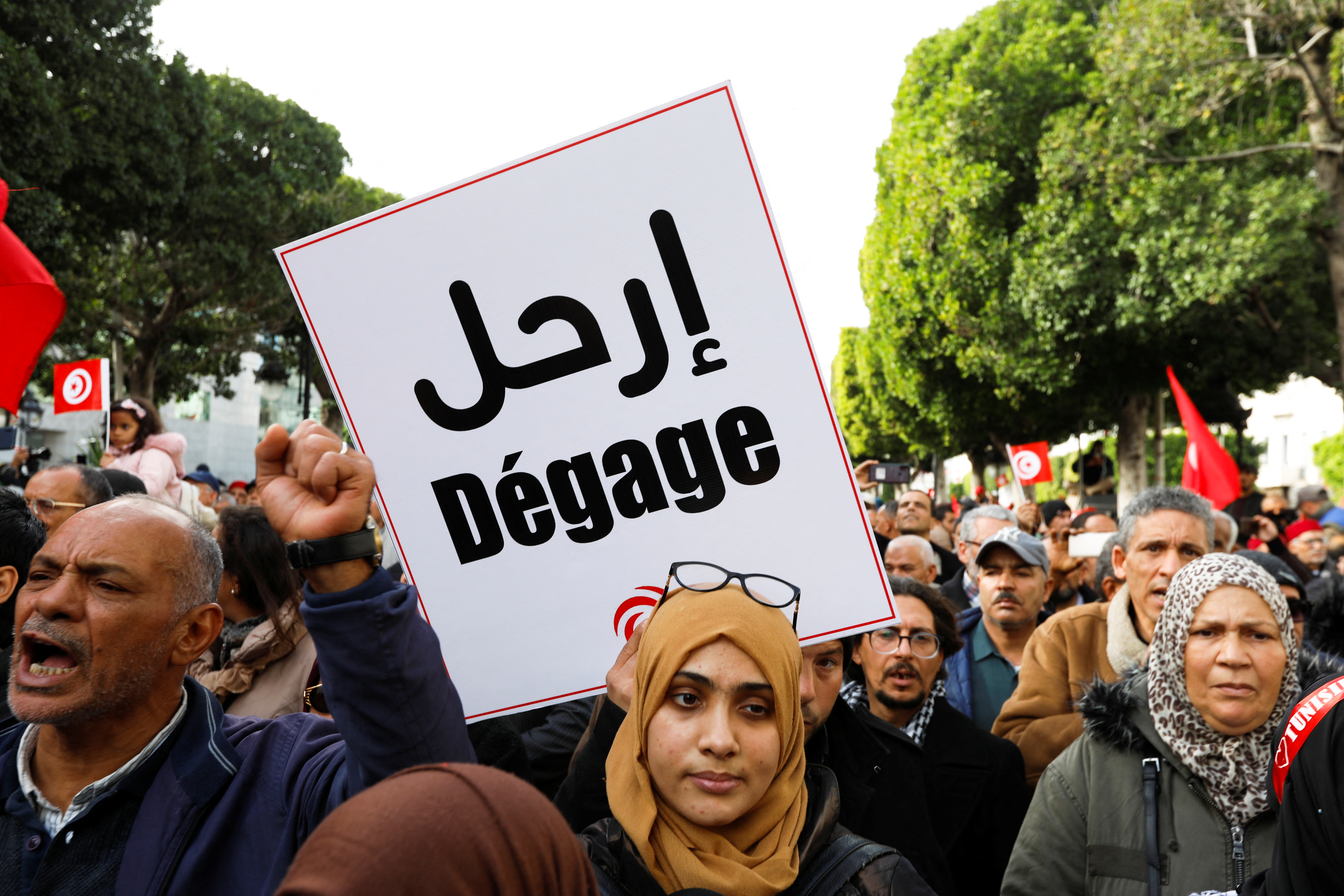Supporters of Tunisian opposition groups protest against the upcoming parliamentary election in Tunis