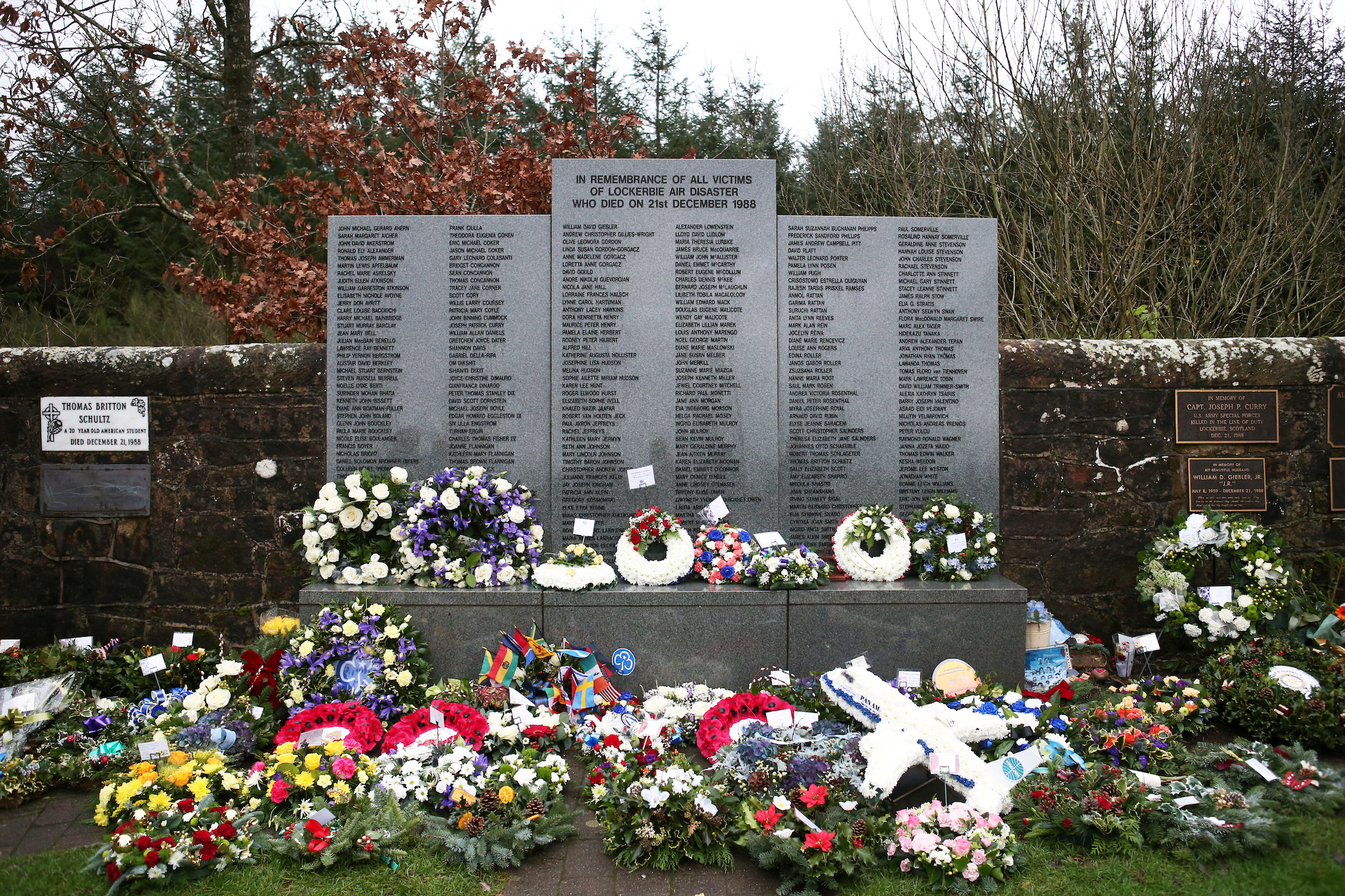 Floral tributes left at the Memorial Garden in Dryfesdale Cemetery, are seen on the morning of the 30th anniversary of the bombing of Pan Am flight 103 which exploded over the Scottish town on December 21, 1988.