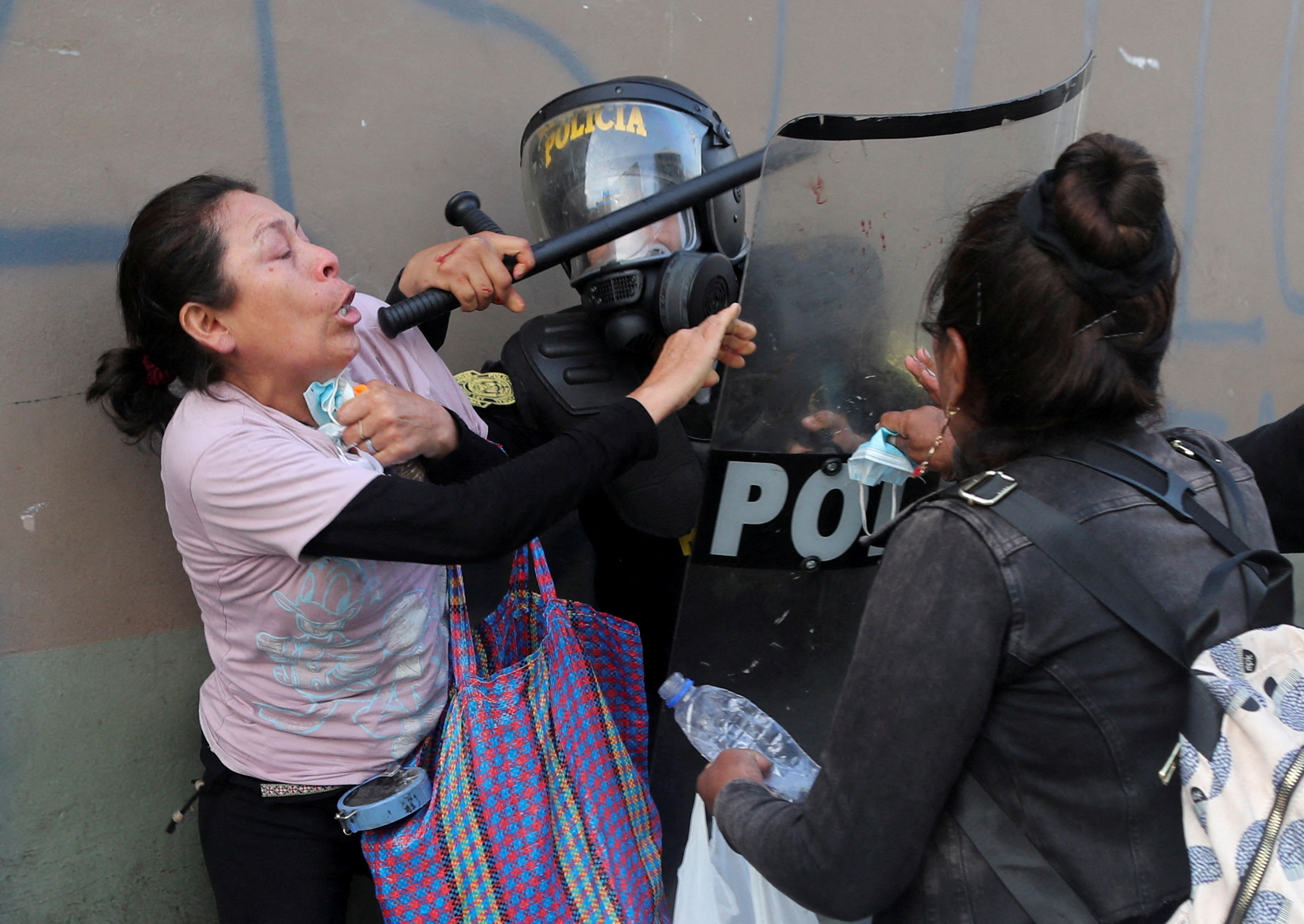 Protesters in Peru clash with police