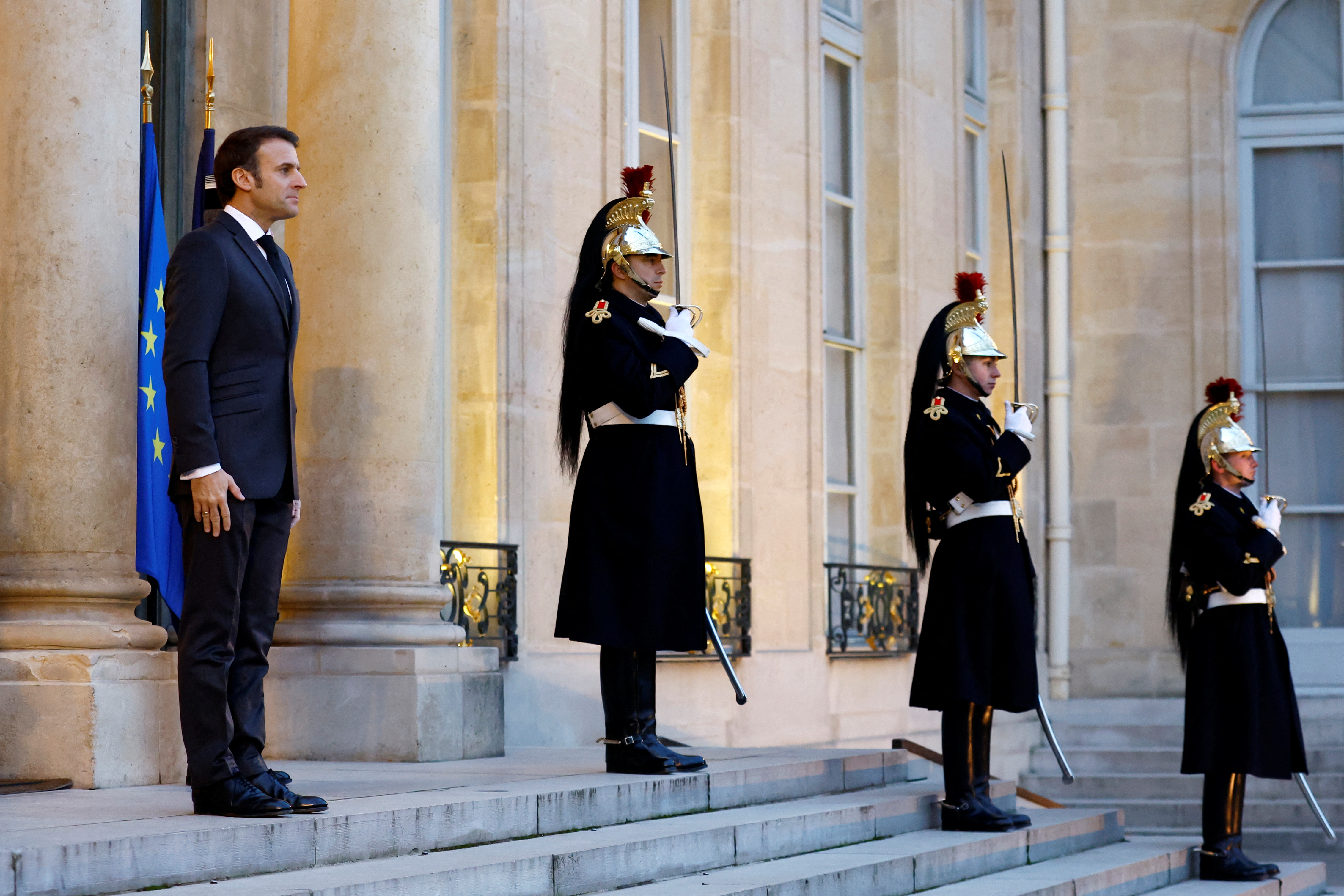 French President Emmanuel Macron welcomes Ukrainian Prime Minister Denys Shmyhal (not seen) as he arrives for a meeting at the Elysee Palace as part of the international conference "Standing With the Ukrainian People" in Paris, France, December 13, 2022. REUTERS/Gonzalo Fuentes