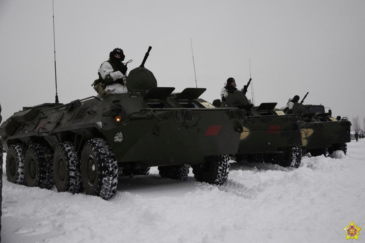 Service members of the 38th Brest Separate Guards Air Assault Brigade of the Belarusian armed forces are seen atop of armoured personnel carriers during a snap inspection of troops' combat readiness at an unknown location in Belarus, in this handout picture released December 13, 2022. Dmitry Beletsky/Defence Ministry of Belarus/Handout via REUTERS ATTENTION EDITORS - THIS IMAGE WAS PROVIDED BY A THIRD PARTY. NO RESALES. NO ARCHIVES. MANDATORY CREDIT. WATERMARK FROM SOURCE.