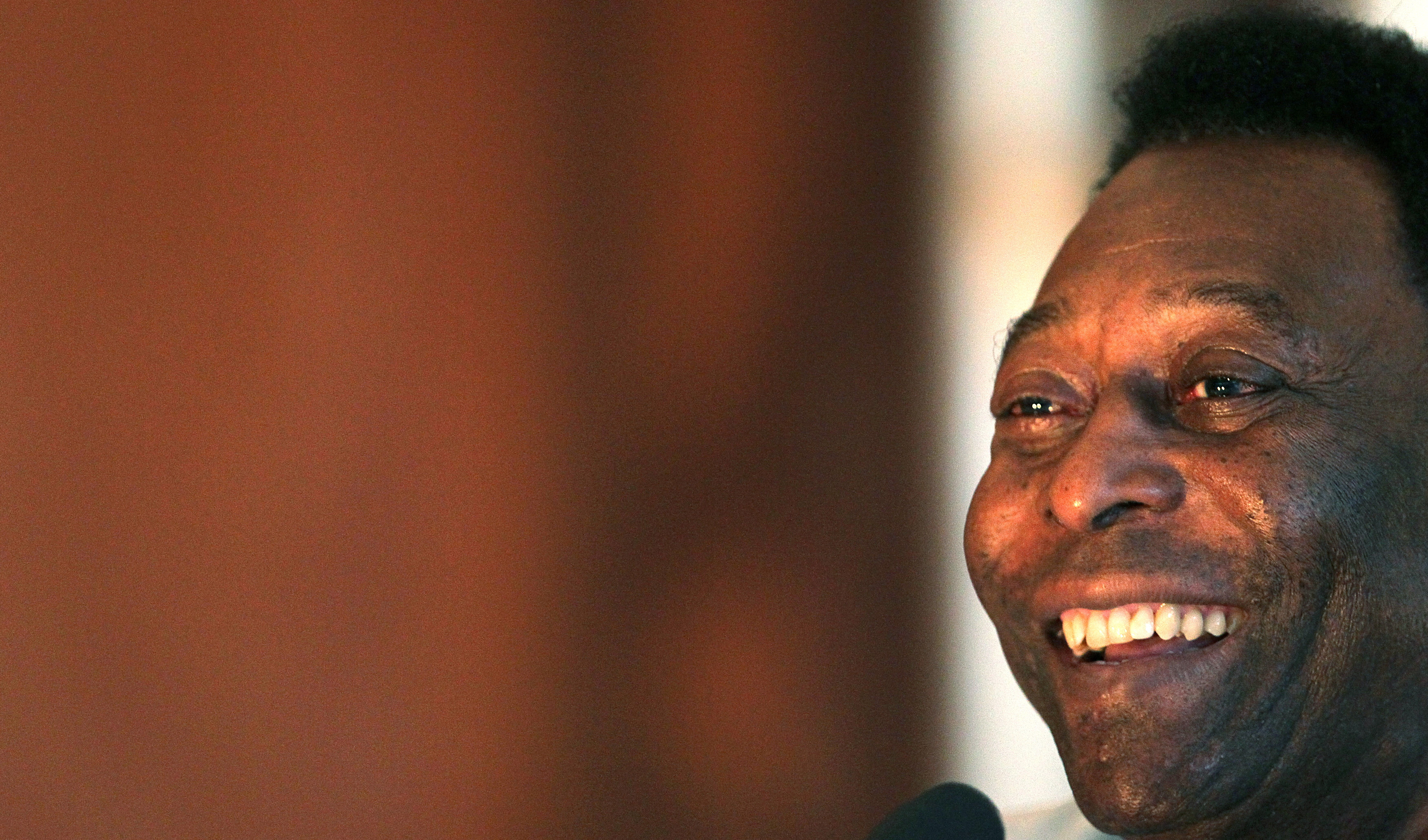 Pele smiles during a news conference
