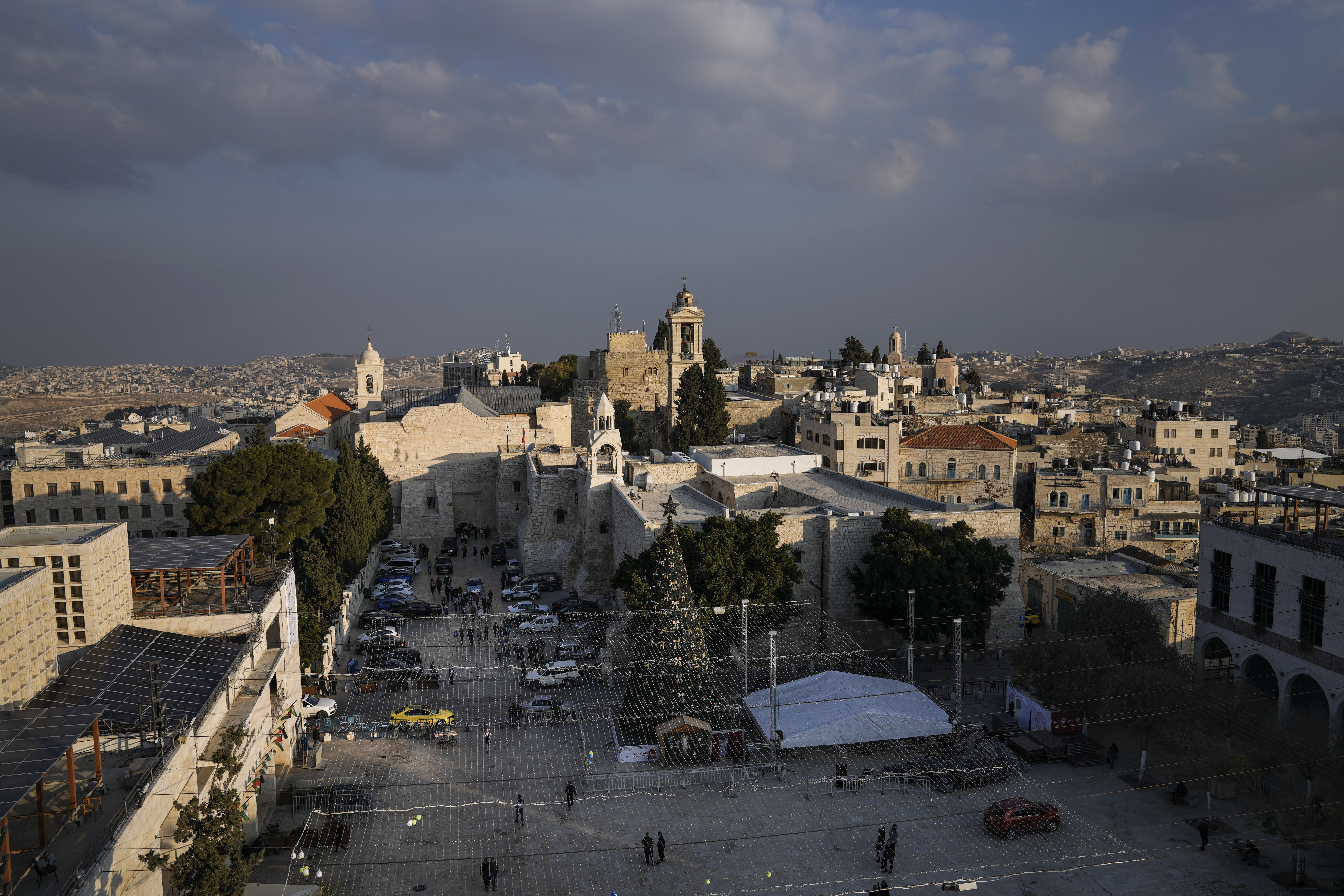 A Christmas tree decorates Manger Square