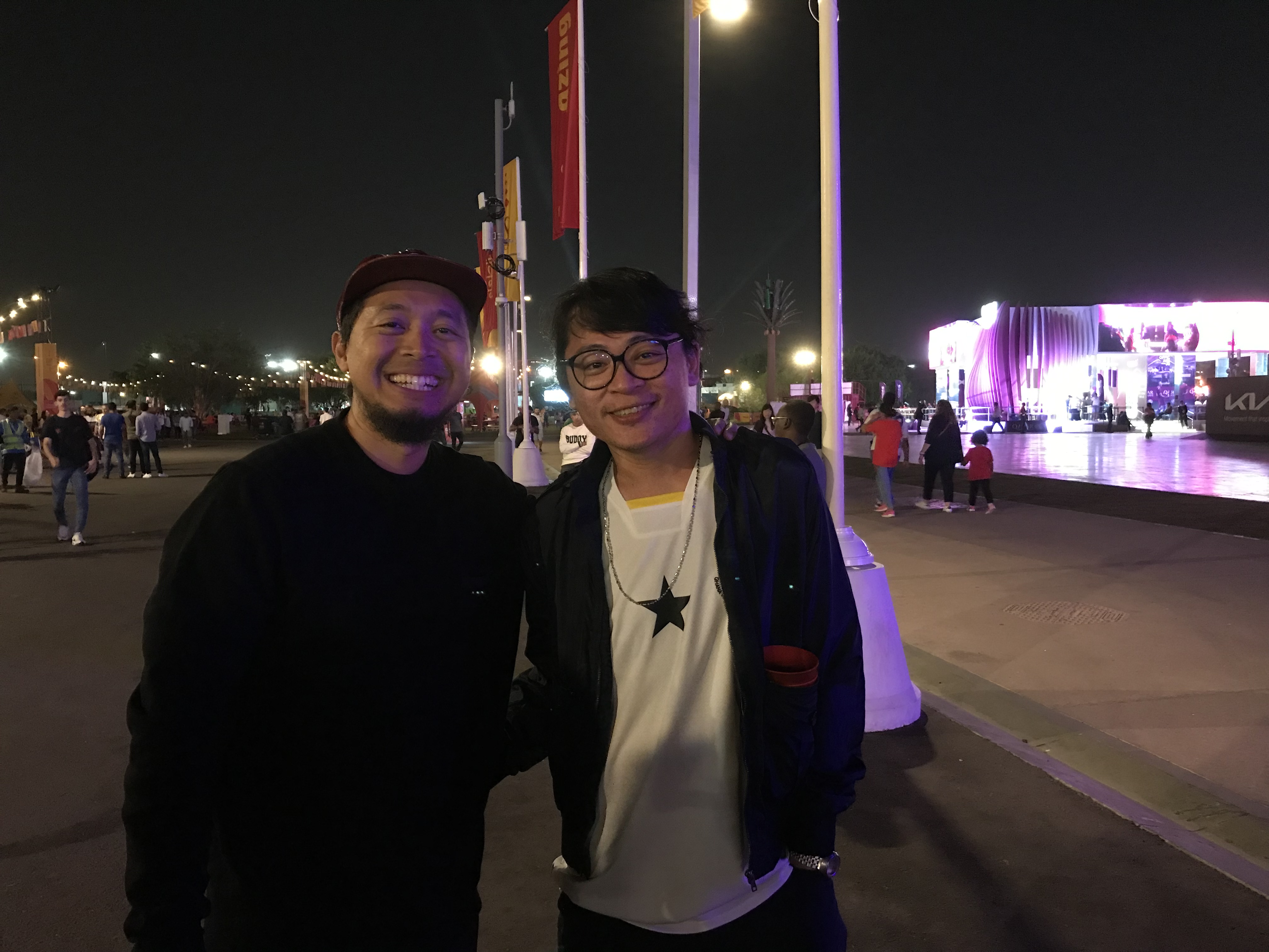 Two Malaysian football fans in Doha for the 2022 World Cup (Hafsa Adil/Al Jazeera)