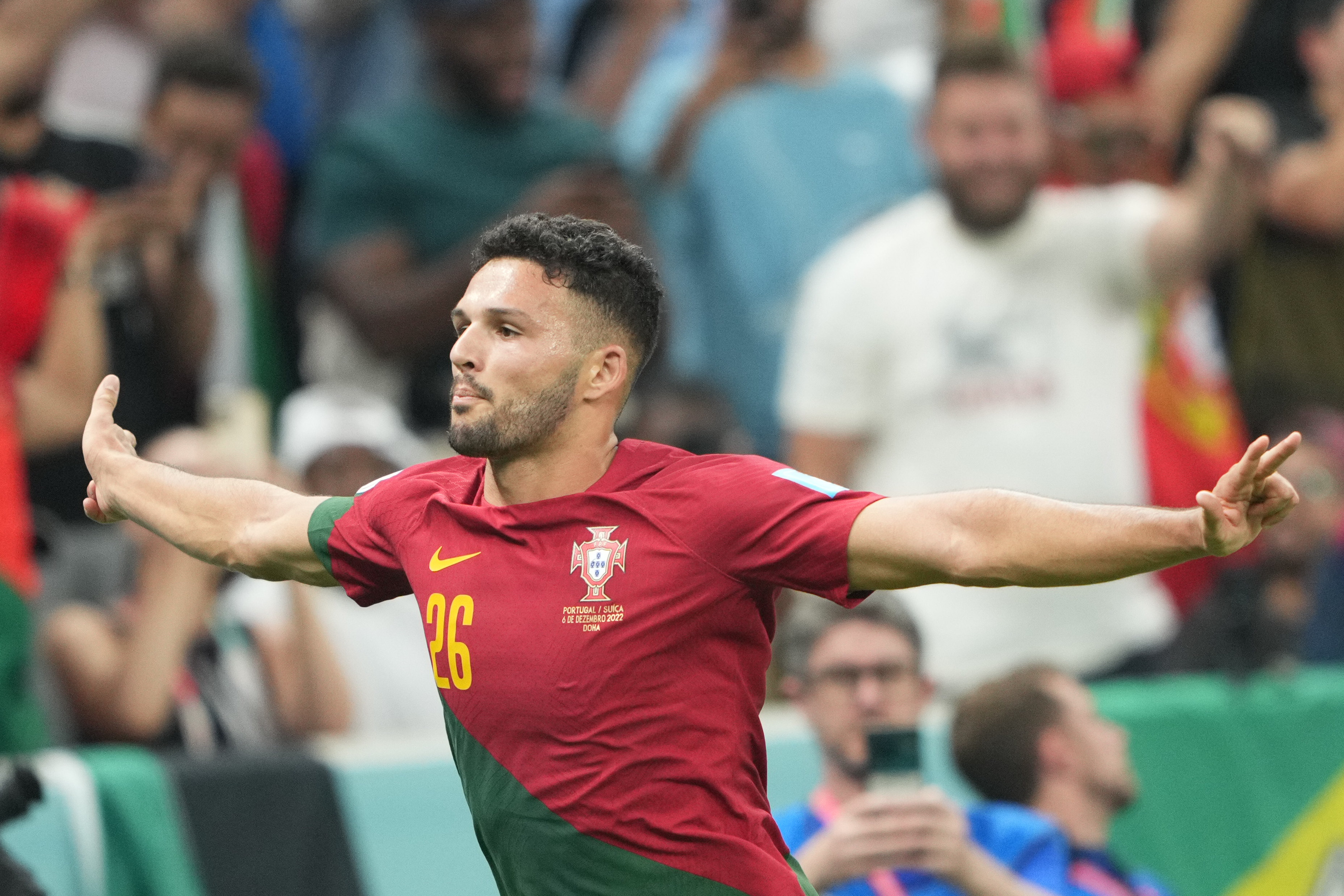 Goncalo Ramos, who scored a hat-trick in Portugal vs Switzerland match, celebrates with open arms.
