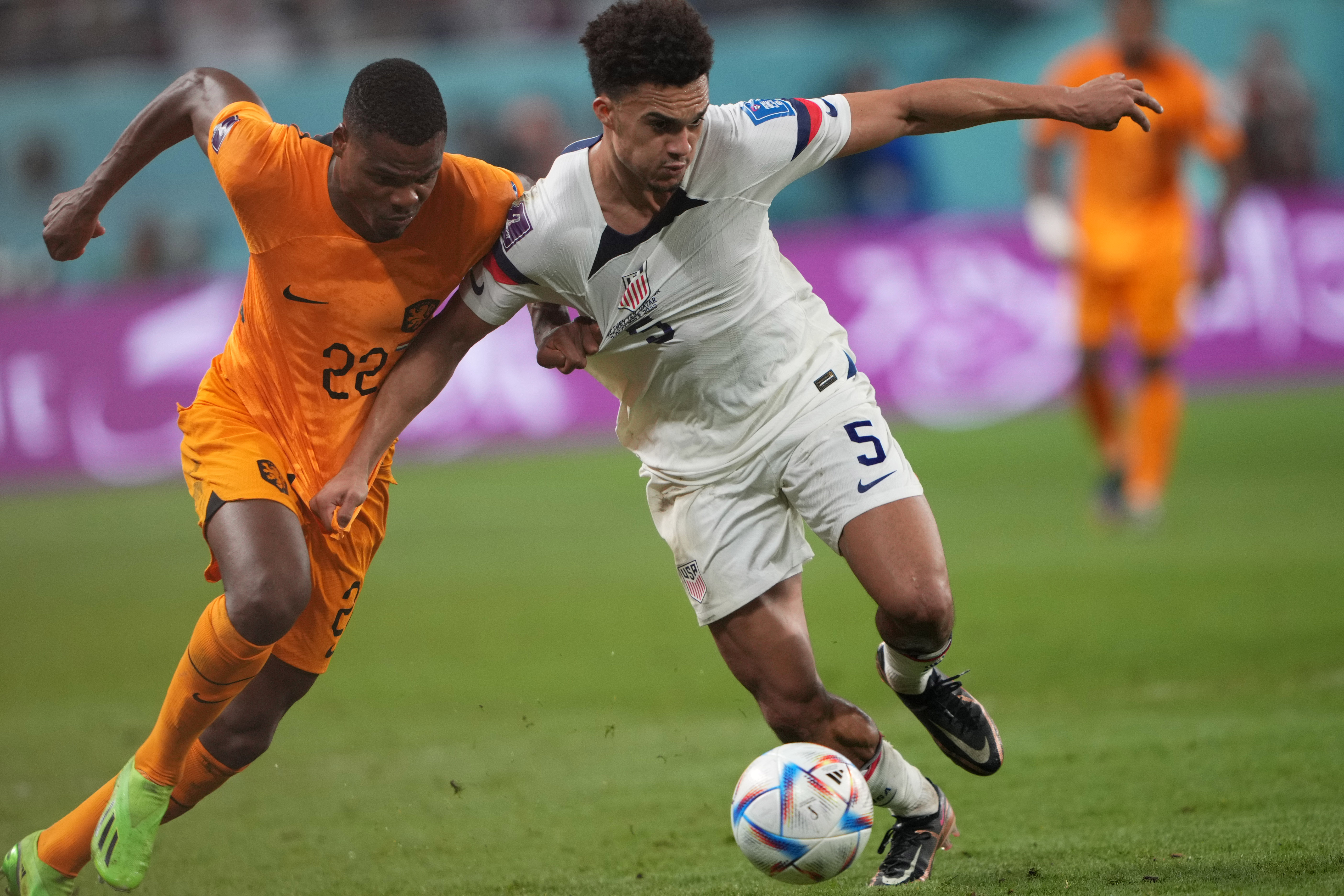 Dutch and USA players battle for the ball during the Netherlands vs USA game.