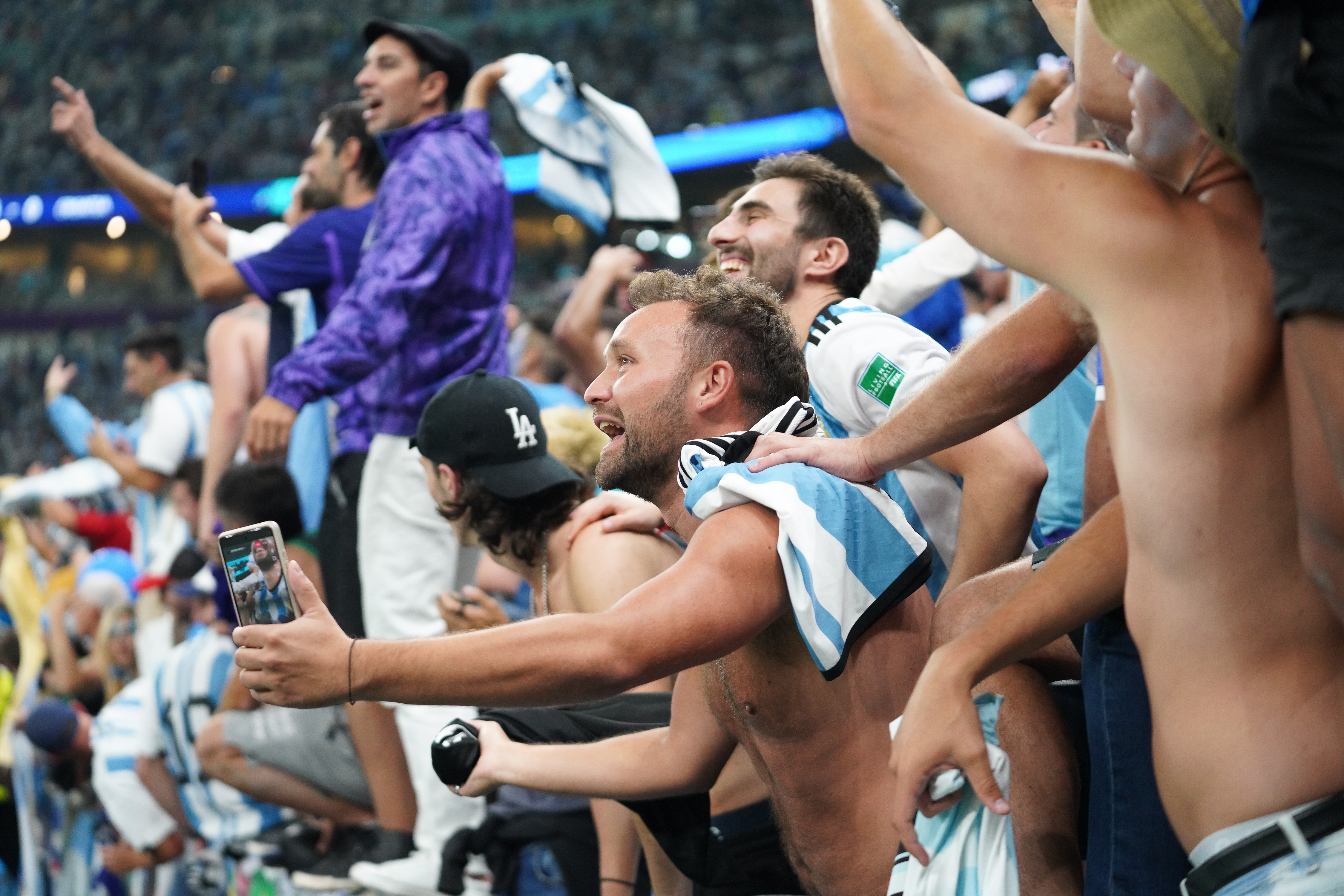 Argentina fans celebrate at Lusail Stadium in Qatar.