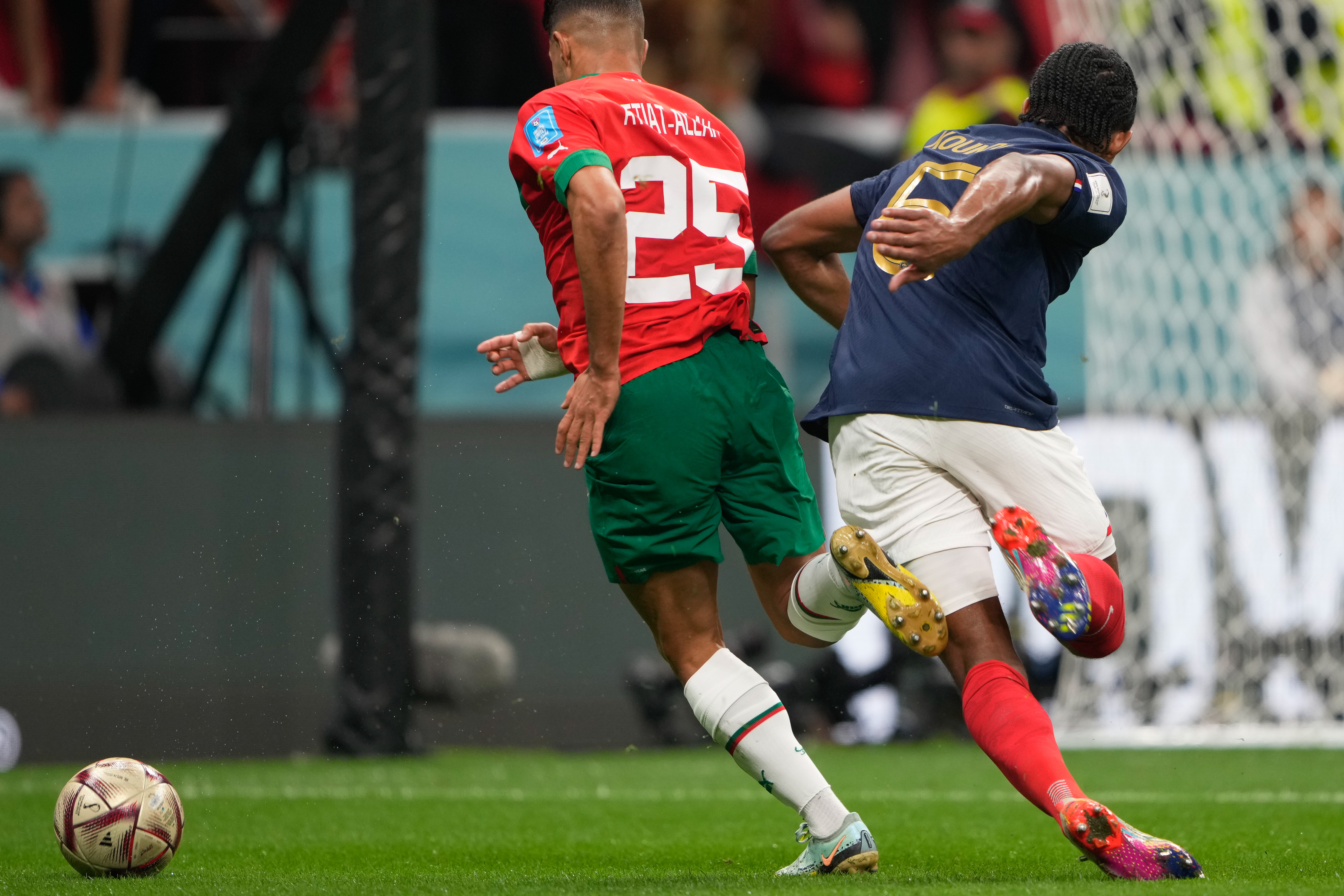 Yahya Attiat-Allah #25 in action with Jules Kounde #5.