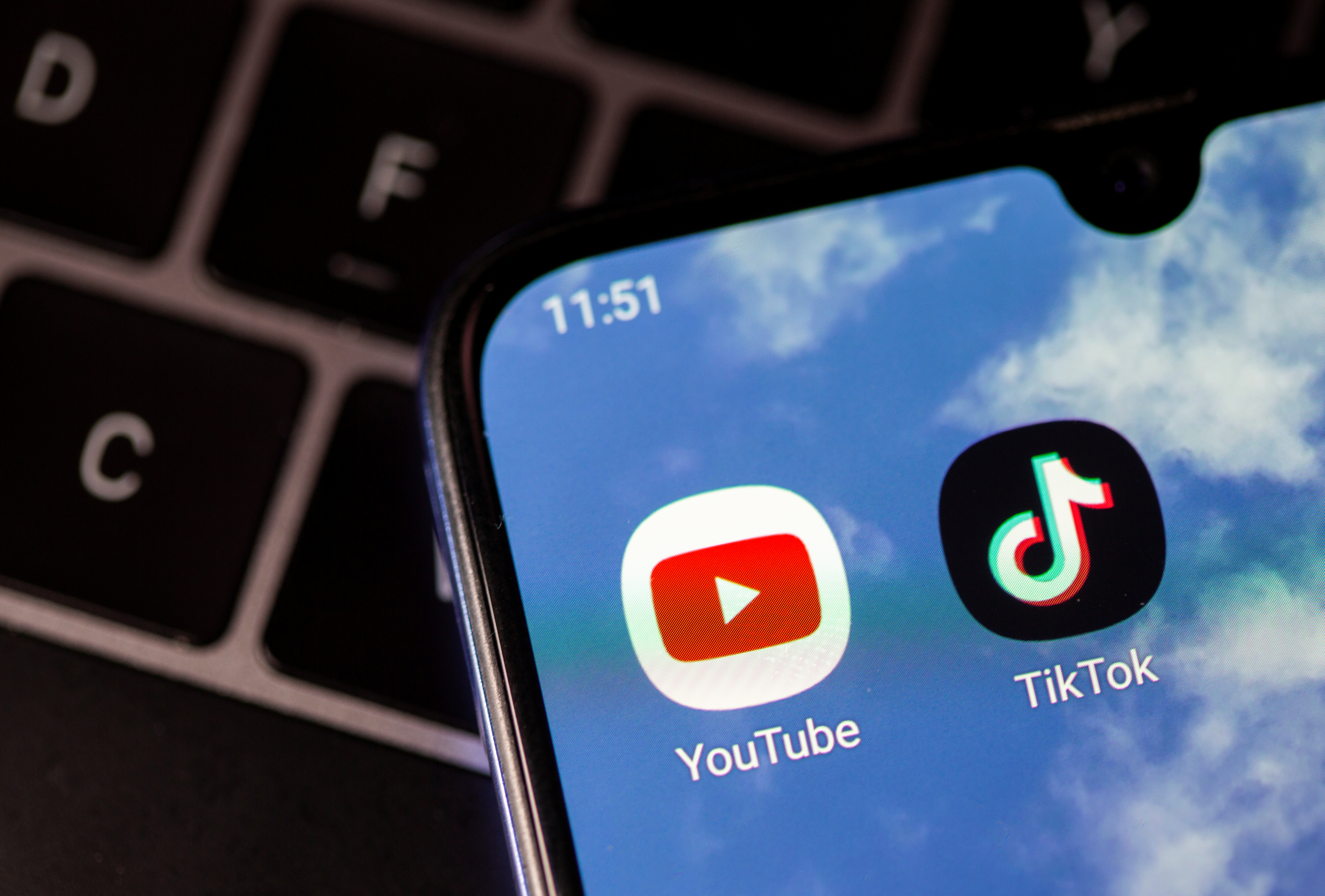 Tik Tok and Youtube app icon are seen on a smartphone in this illustration taken, September 15, 2020.