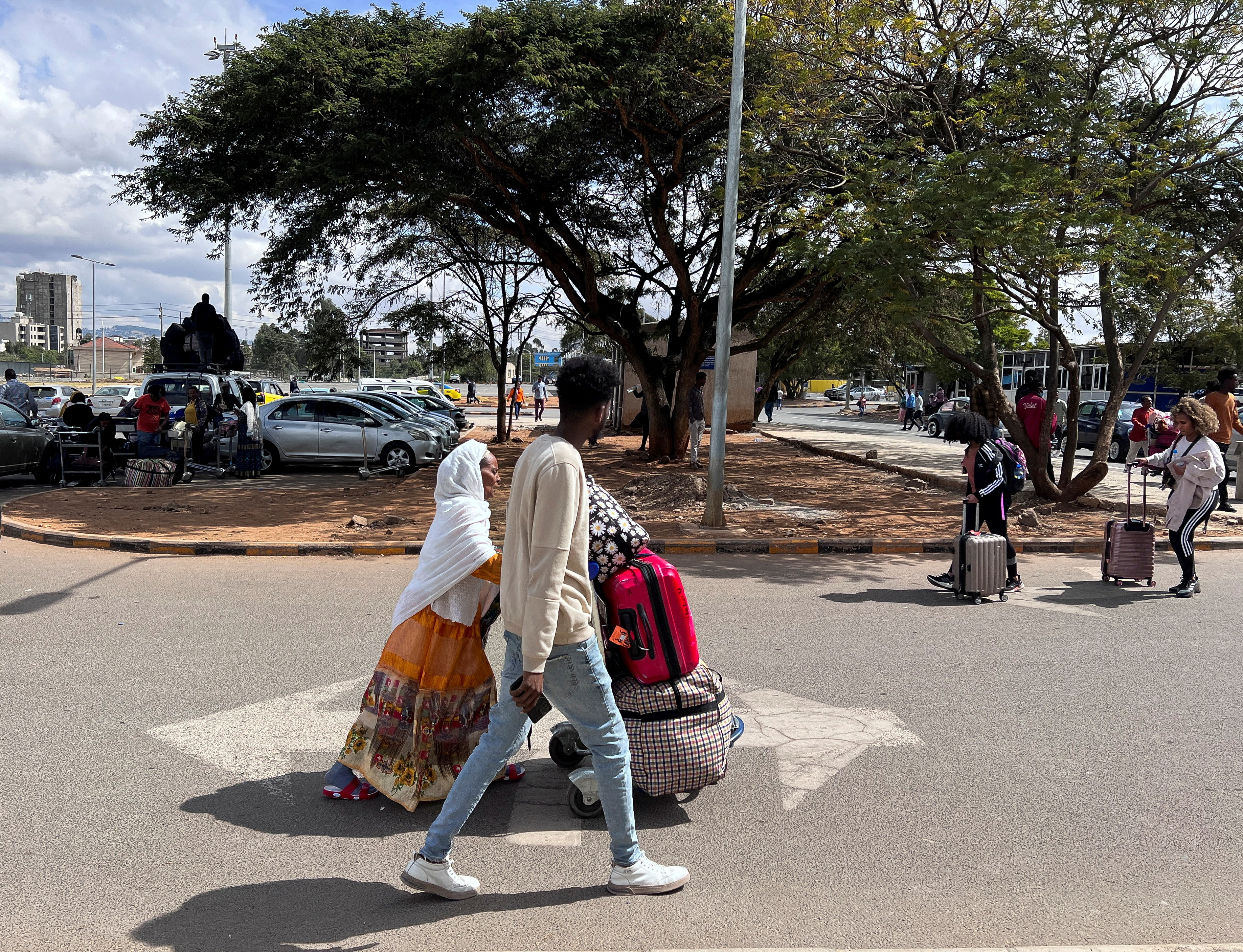 Passengers arrive before travelling on board the Ethiopian Airlines plane that resumes flights to Mekelle, the capital of Tigray, at the Bole International Airport in Addis Ababa, Ethiopia December 28, 2022.