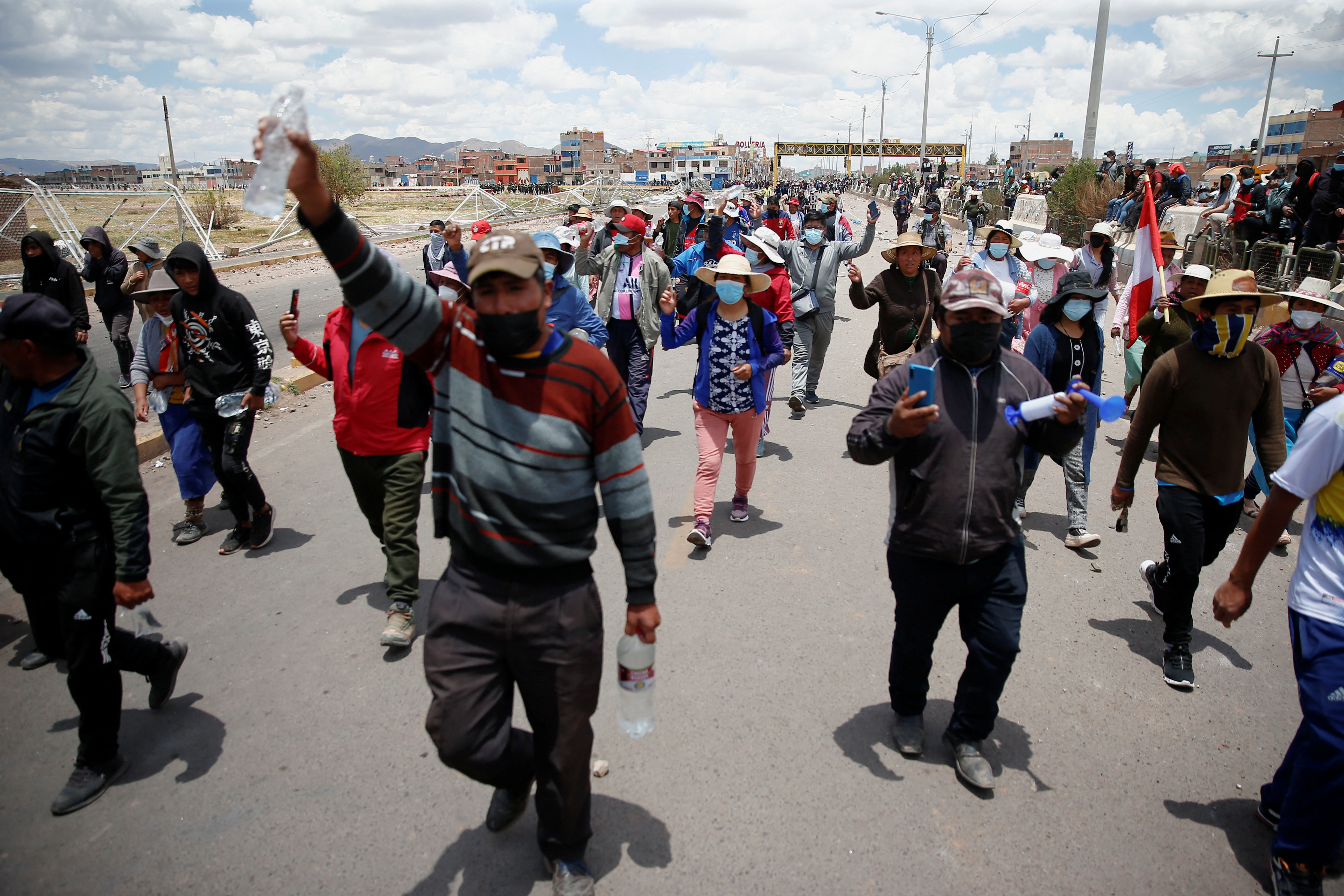 Riot police clash with anti-government protesters