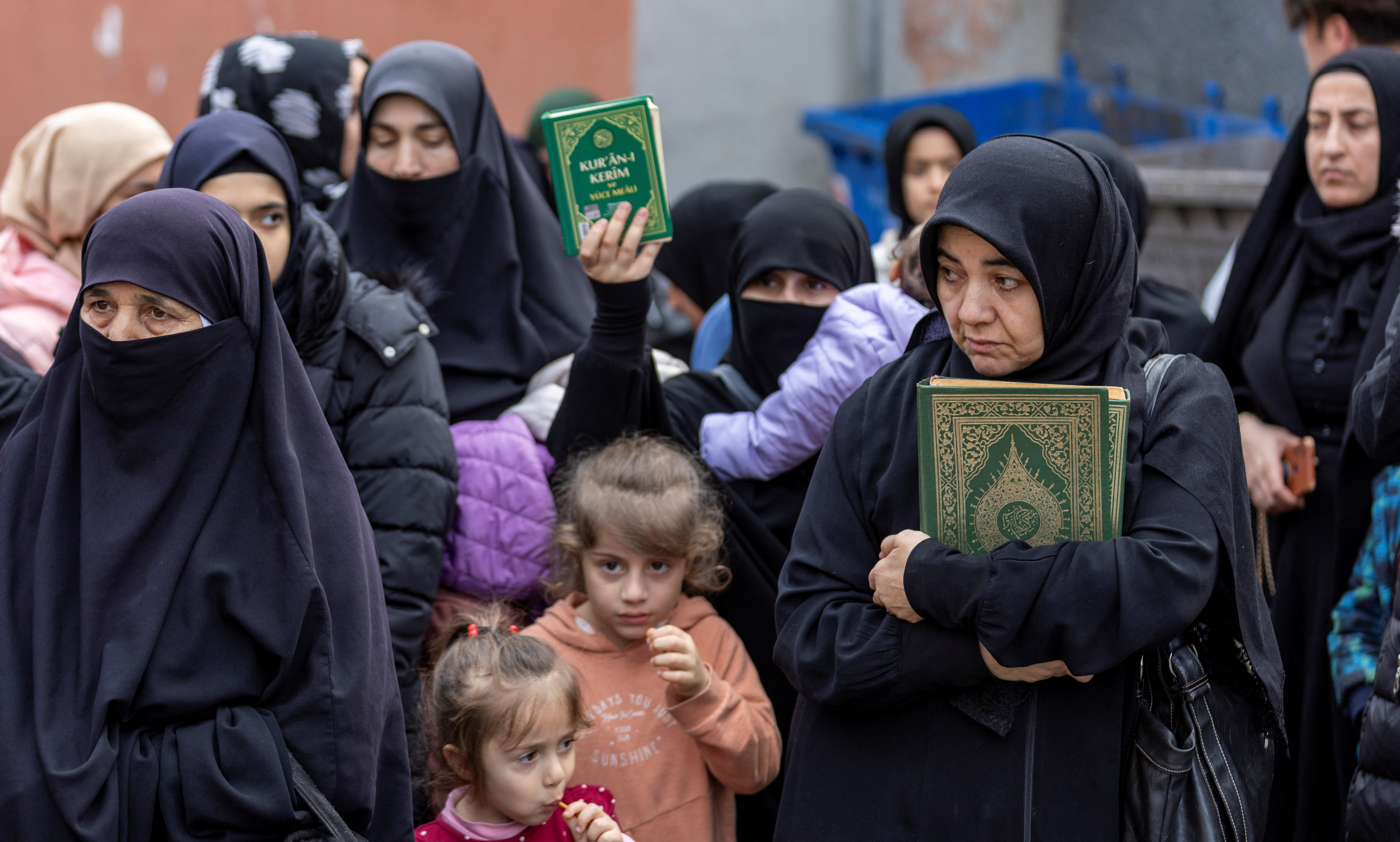 Protesters hold copies of the Koran as they demonstrate in front of the Consulate General of Sweden after Rasmus Paludan, leader of Danish far-right political party Hard Line, burned a copy of the Koran near the Turkish Embassy in Stockholm, in Istanbul, Turkey,