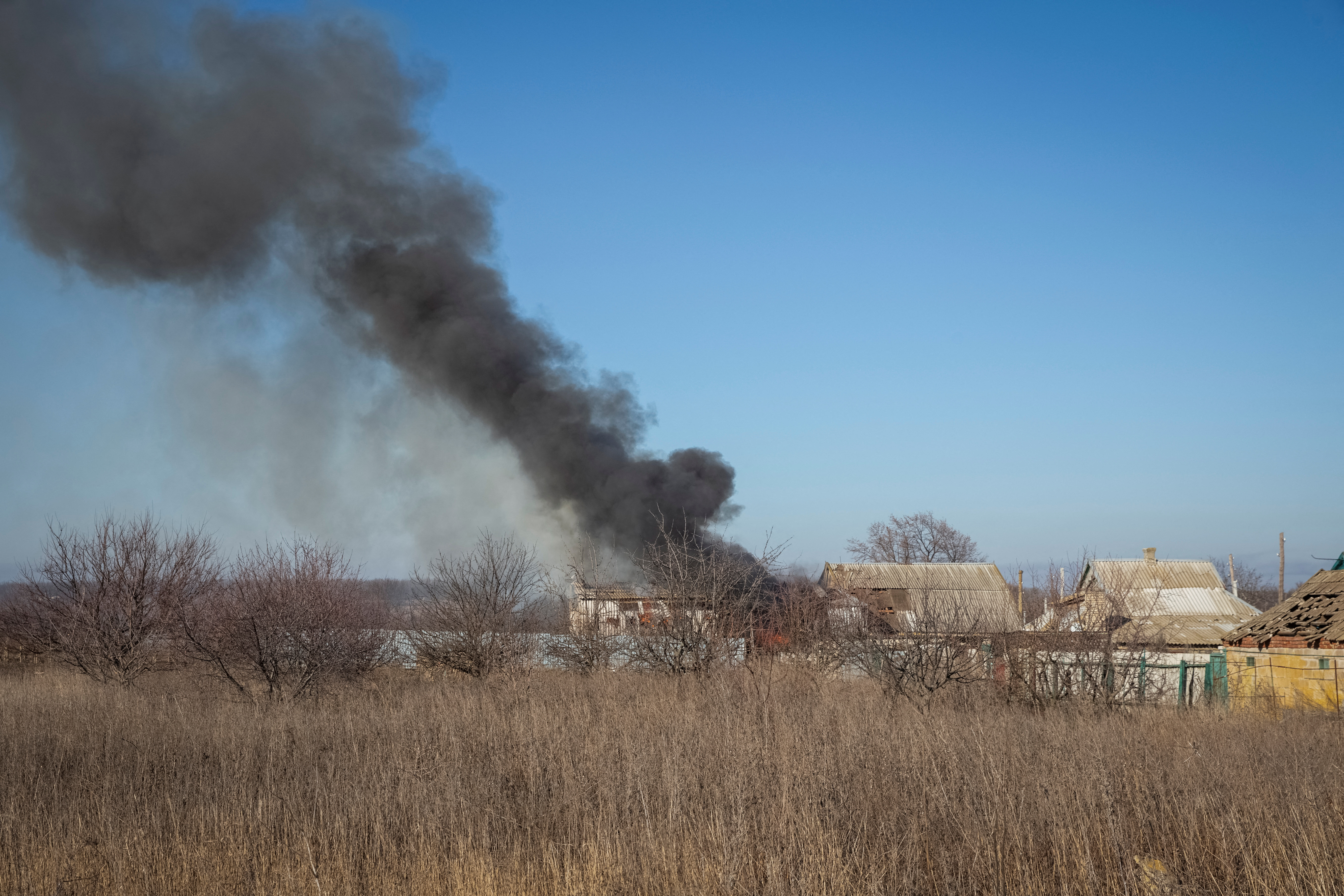 A house burns after a Russian military strike, as Russia's attack on Ukraine continues, near the city of Vuhledar, Donetsk region, Ukraine January 27, 2023