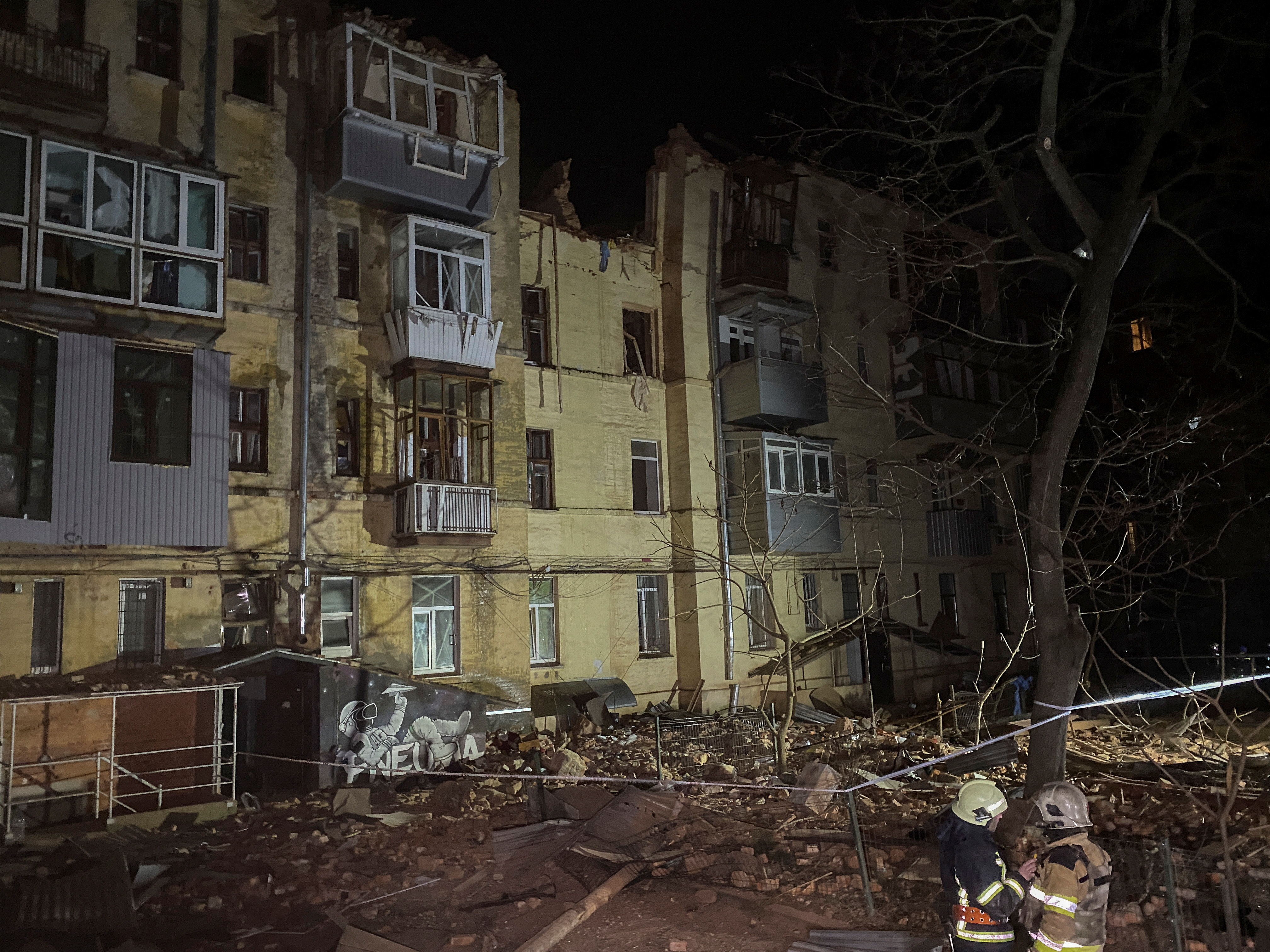 An apartment building damaged by a Russian missile in Kharkiv, Ukraine