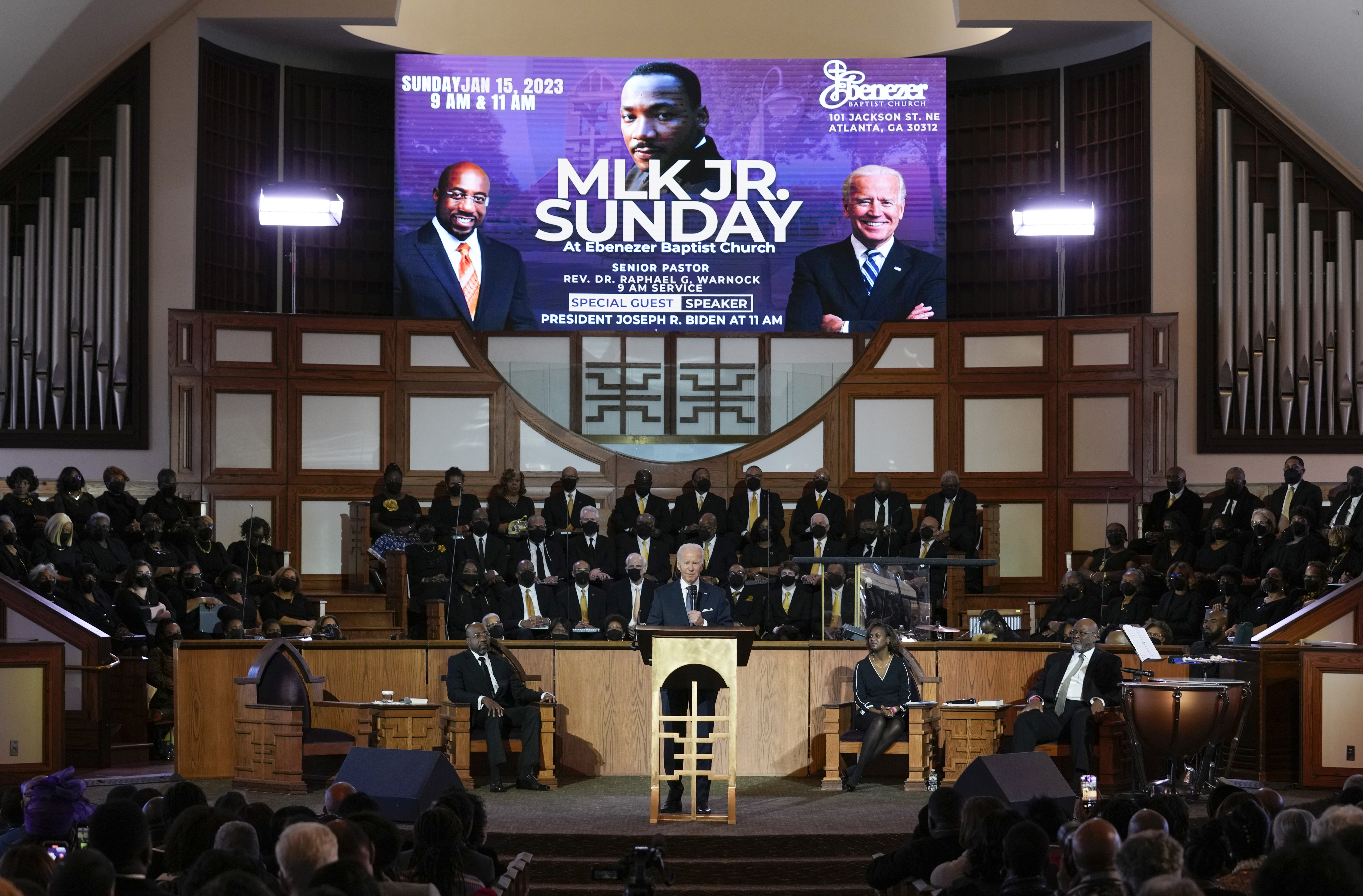 President Joe Biden, joined by Sen. Raphael Warnock, D-Ga., left, and Rev. Chelsea D. Waite, right, speaks at Ebenezer Baptist Church in Atlanta, Sunday, Jan. 15, 2023, during a service honoring Martin Luther King Jr. (AP Photo/Carolyn Kaster)