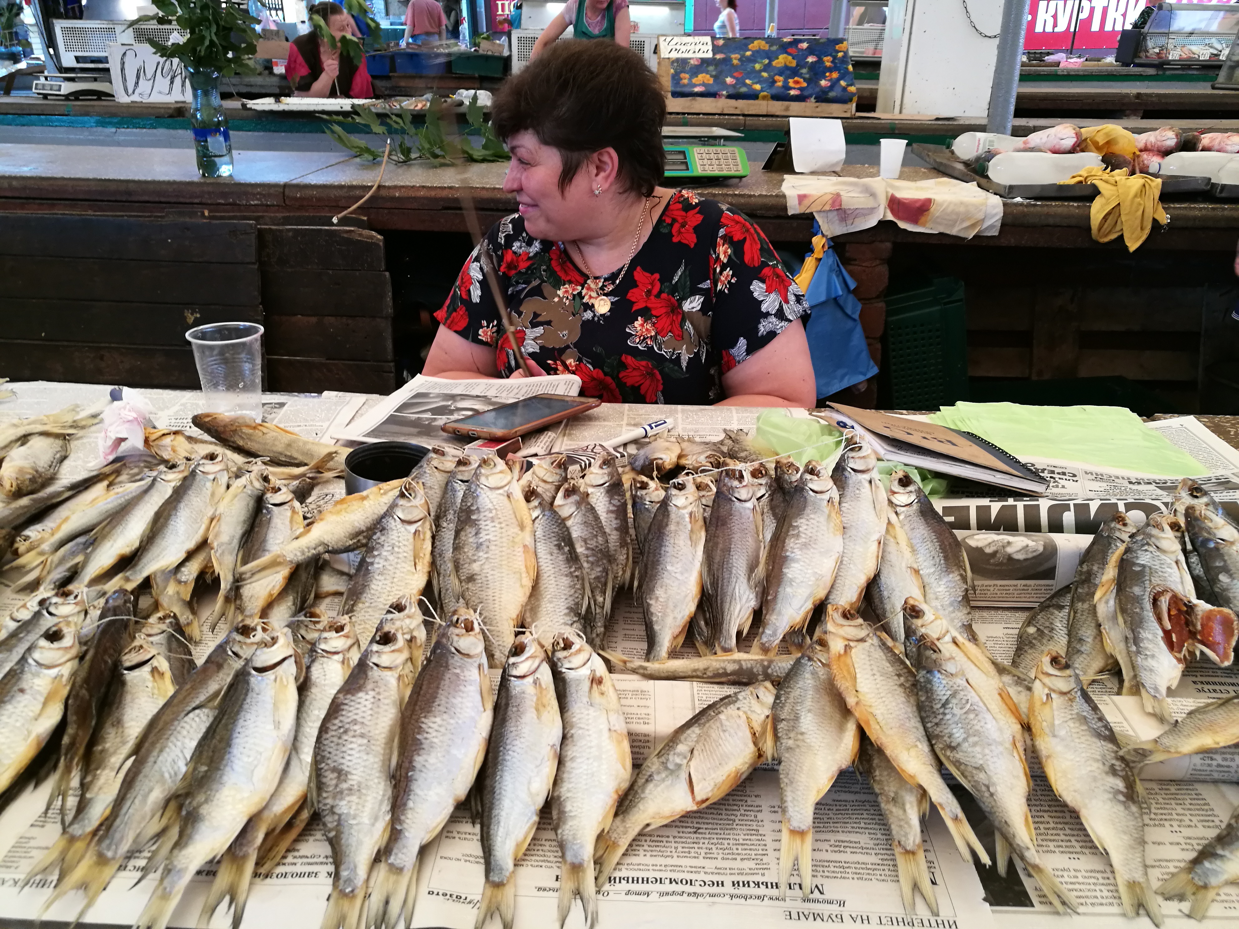 An ethnic Greek woman selling fish