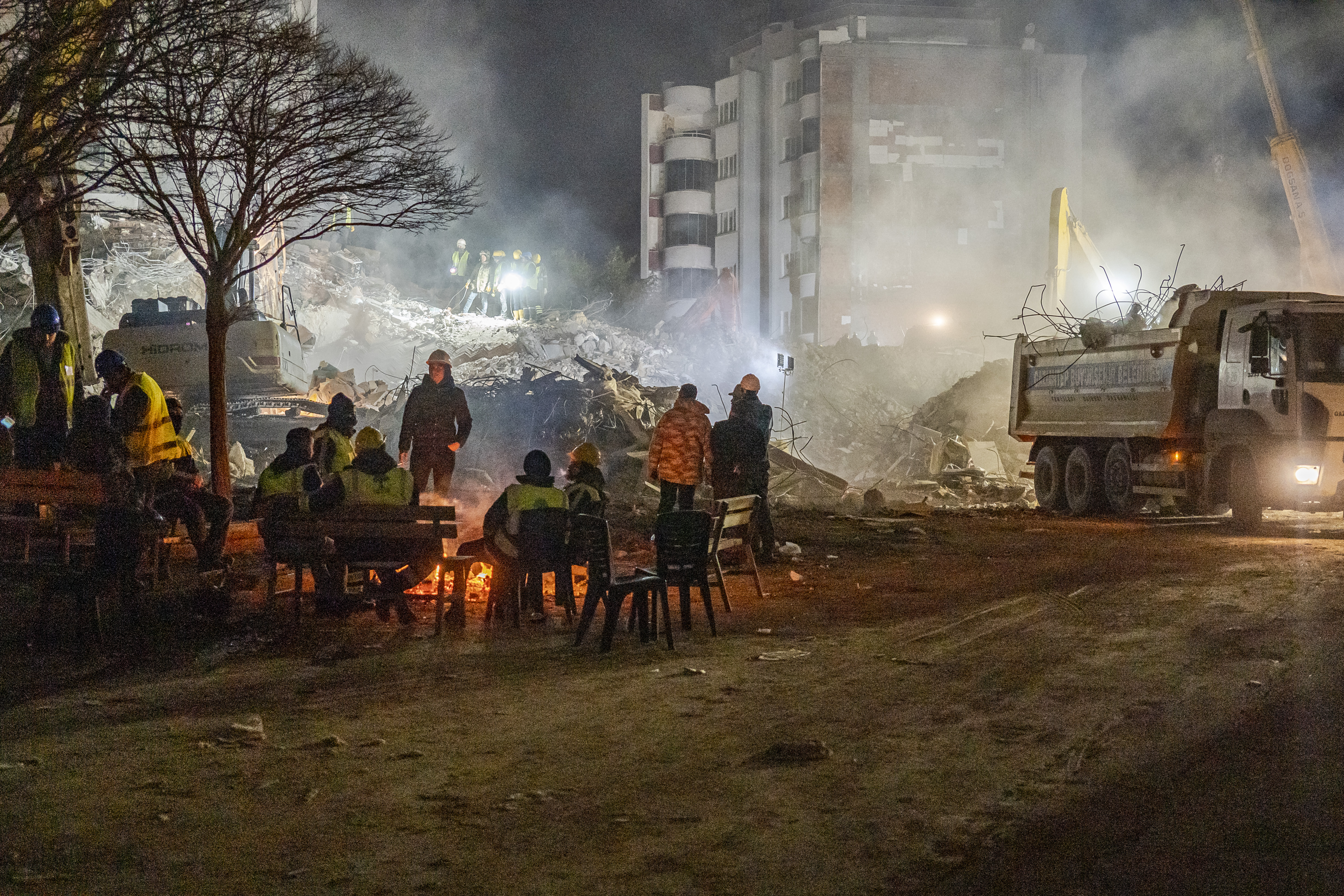 A group of rescue workers in the Ibrahimli neighbourhood in Gaziantep — the area with the highest number of collapsed buildings in the city — continues excavations at night with the hope of still finding survivors