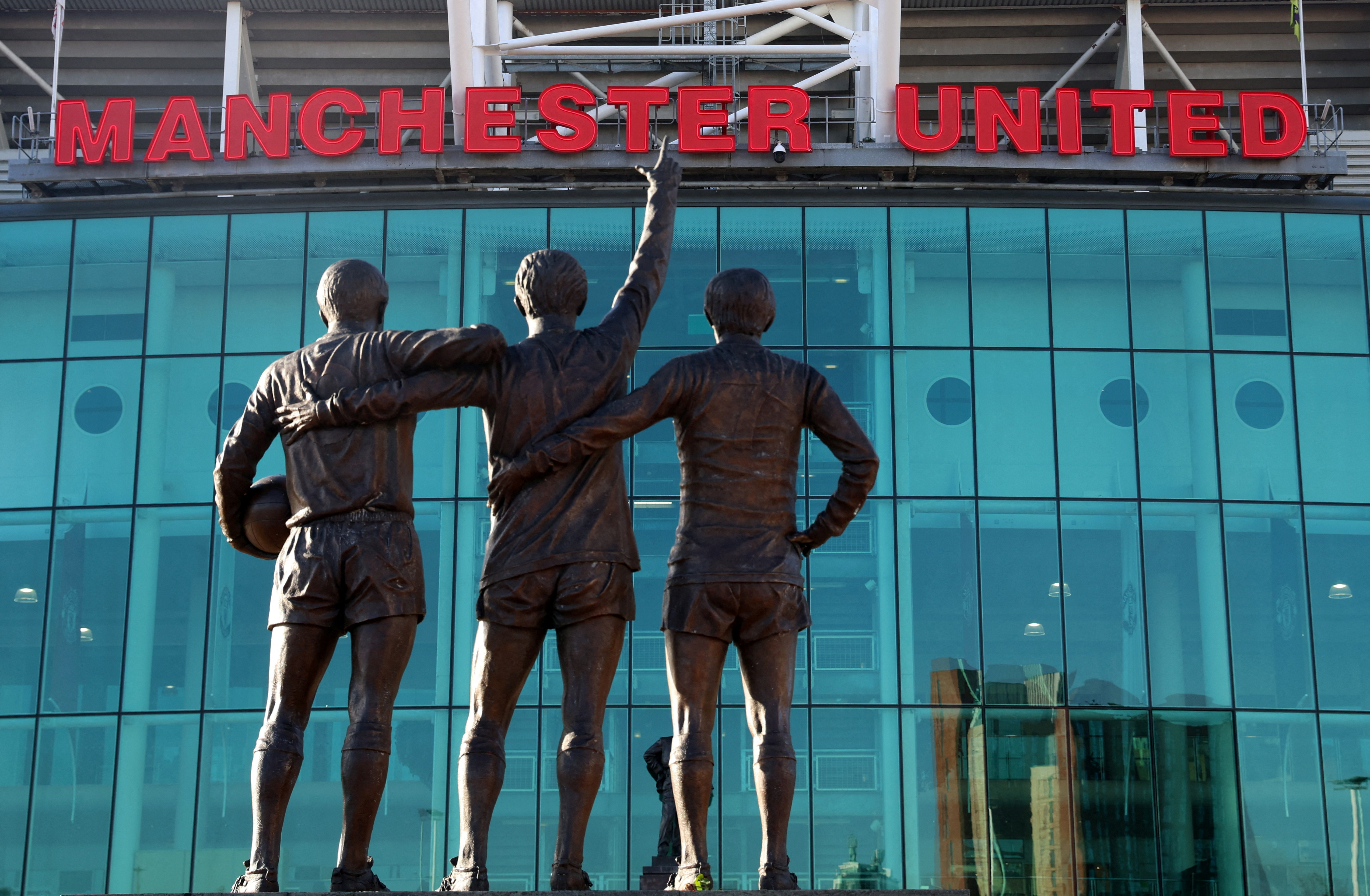 General view of the United Trinity statue outside Old Trafford REUTERS/Phil Noble