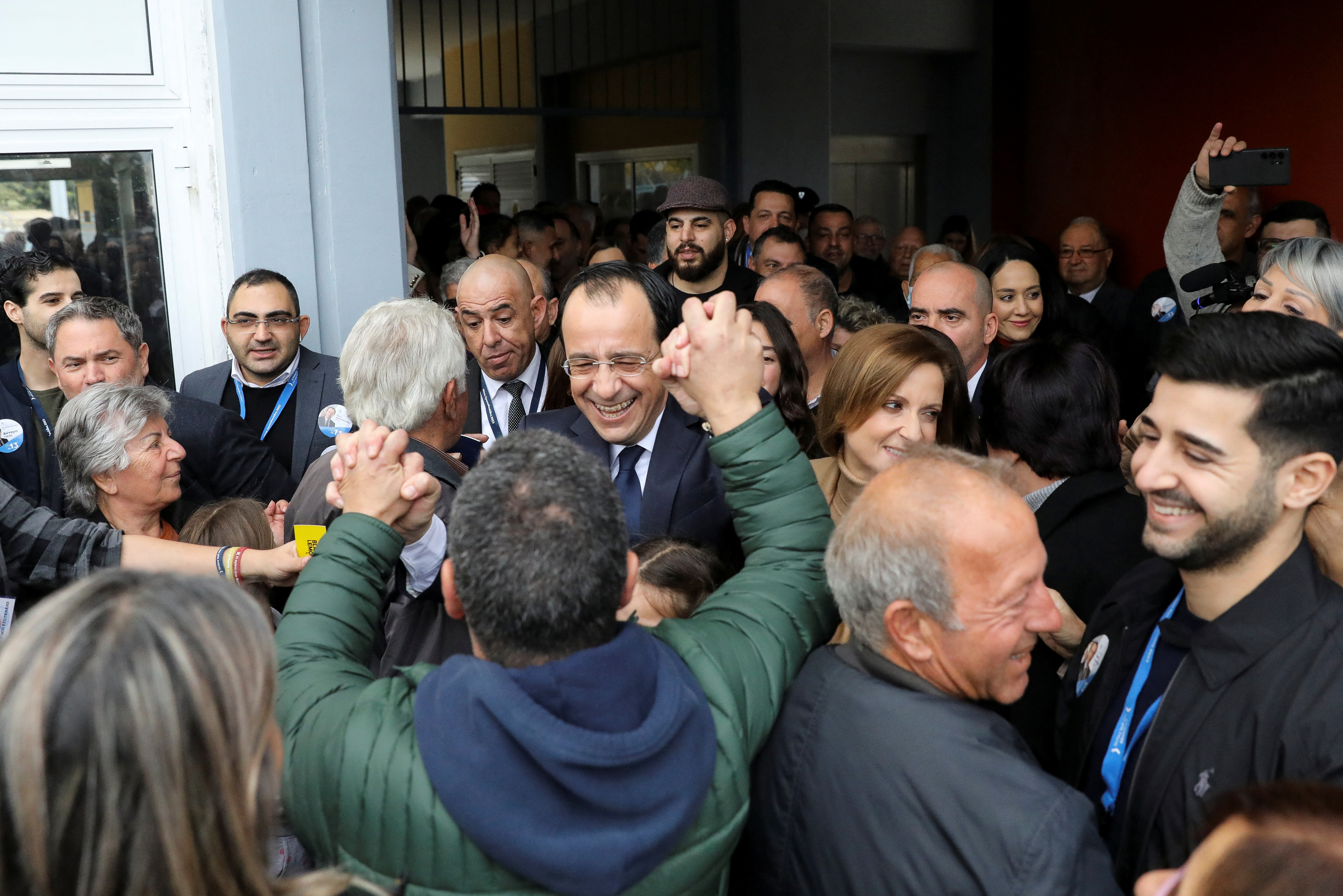 Cyprus independent presidential candidate Nikos Christodoulides meets with supporters outside a polling station on the day of the presidential election, in Geroskipou near Paphos, Cyprus, February 5, 2023.