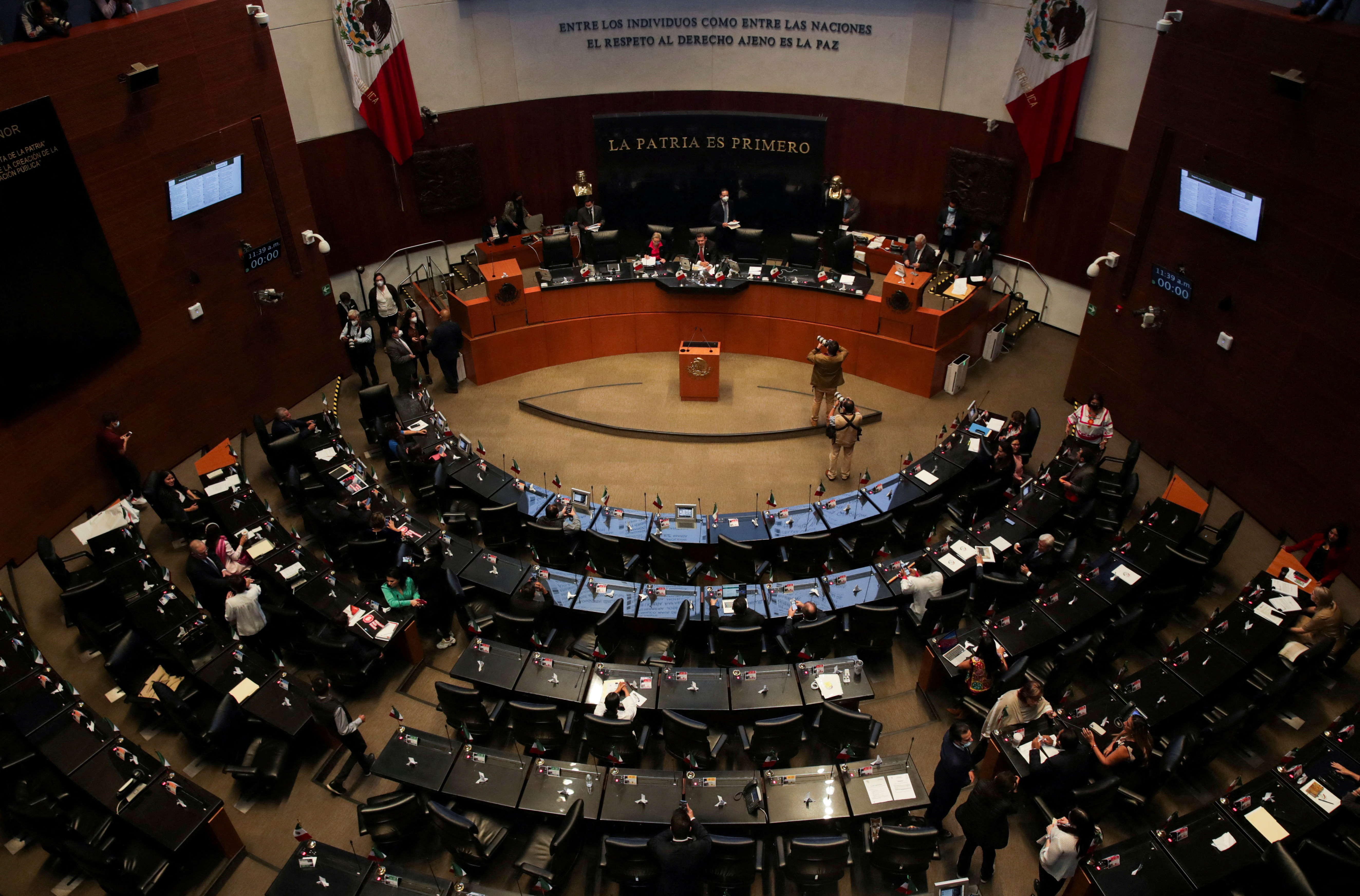 FILE PHOTO: A view shows senators during a session at Mexico's senate as they discusses an initiative by President Andres Manuel Lopez Obrador to give the Army control over the civilian-led National Guard, at Mexico's Senate building, in Mexico City, Mexico September 8, 2022. REUTERS/Henry Romero/File Photo