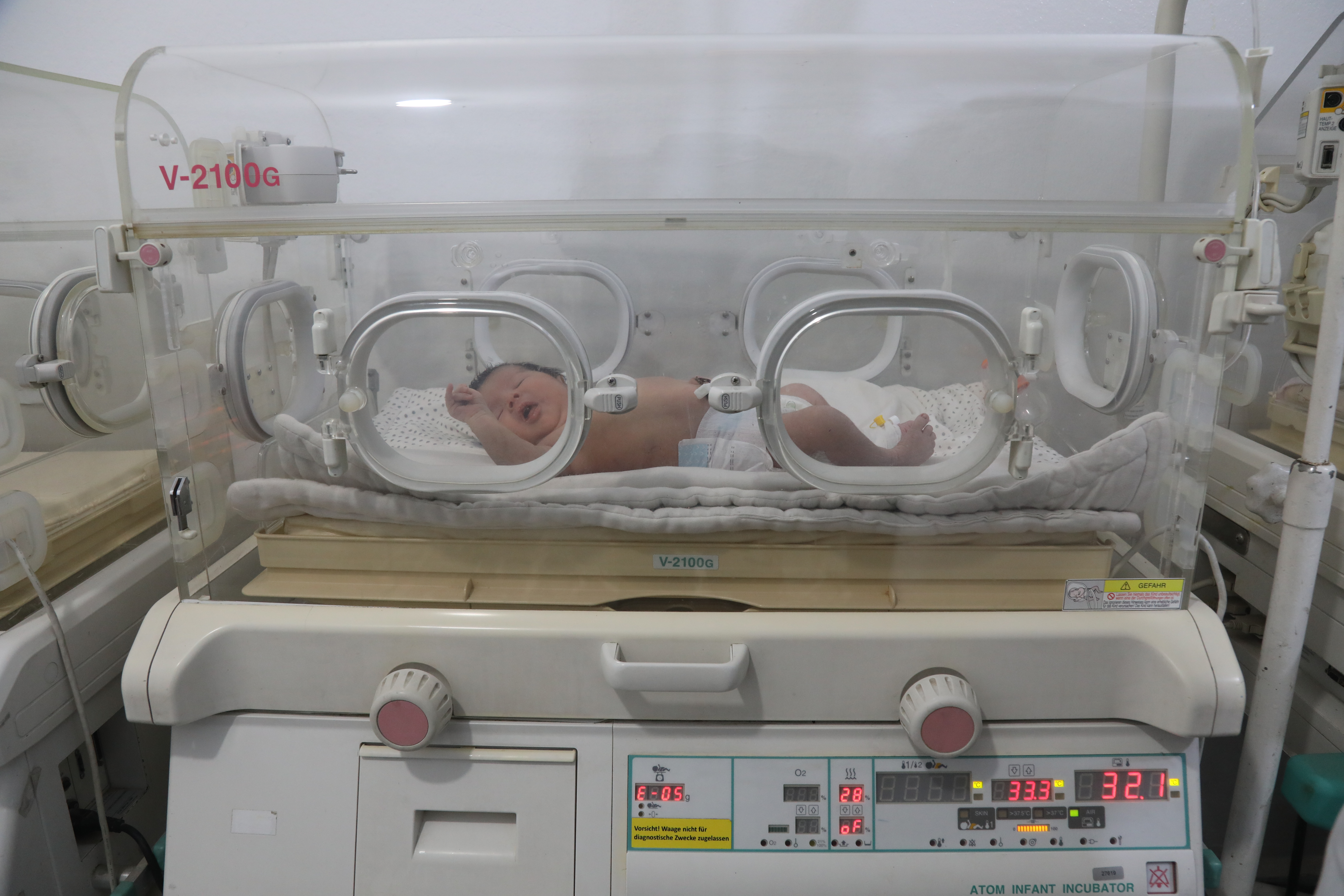 Baby Aya in her incubator