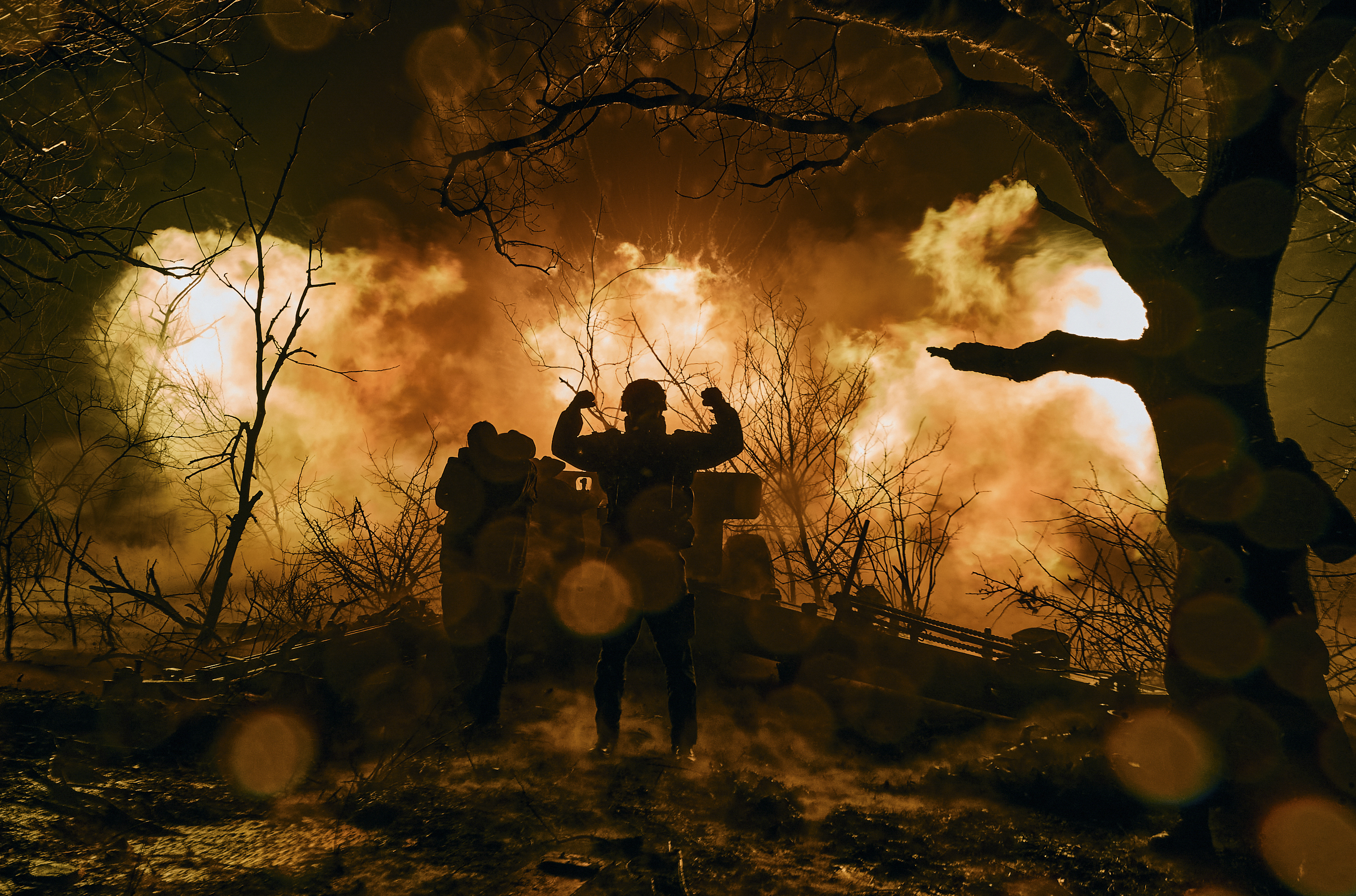 Ukrainian soldiers fire artillery at Russian positions near Bakhmut, Donetsk region, Ukraine, Sunday, Nov. 20, 2022. (AP Photo/LIBKOS, File)