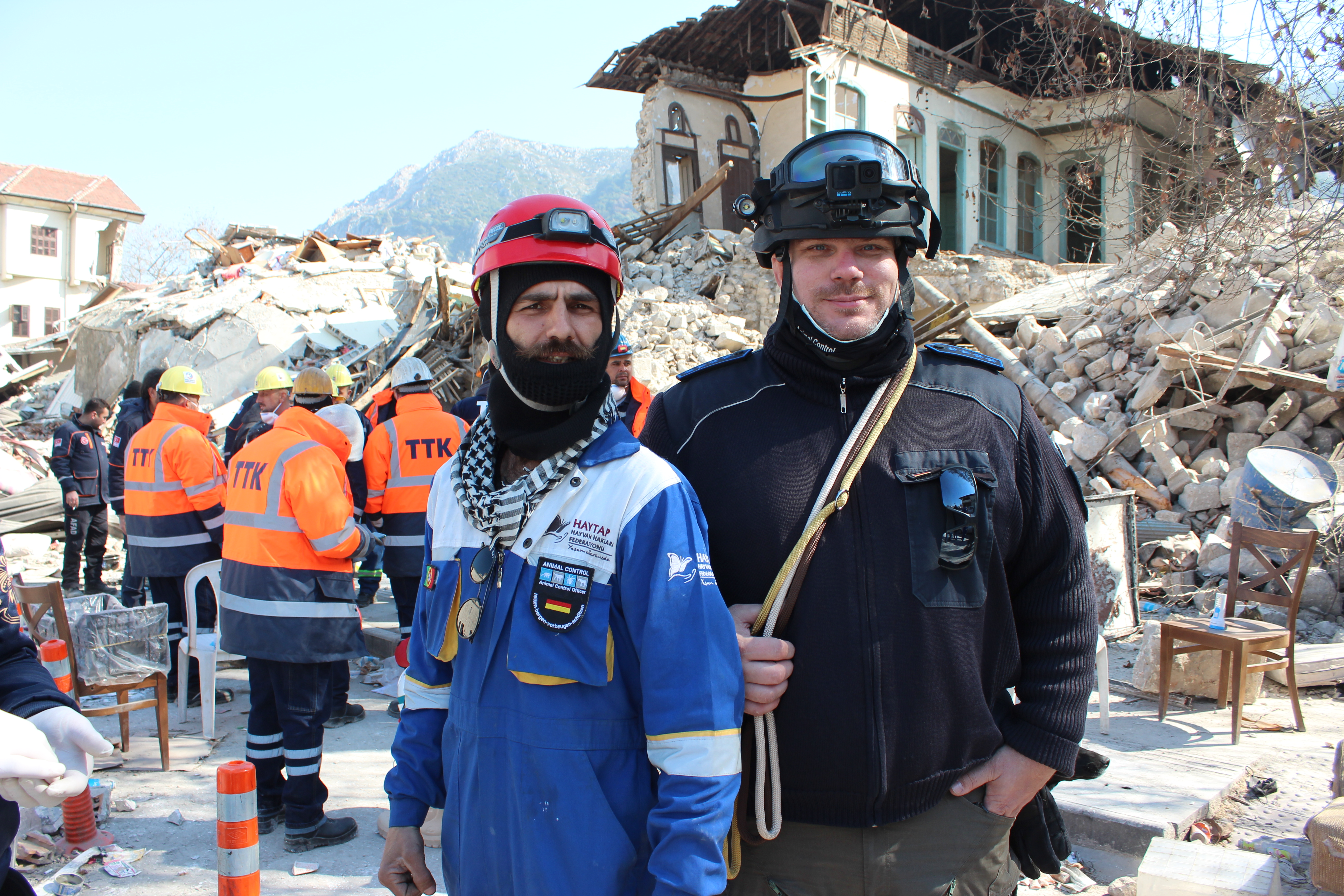 Mehmet Gürkan Tığoğlu, left, head of Haytap's Hatay animal rescue team next to Michael Sehr, an animal rescuer from Germany, in Antakya's old town