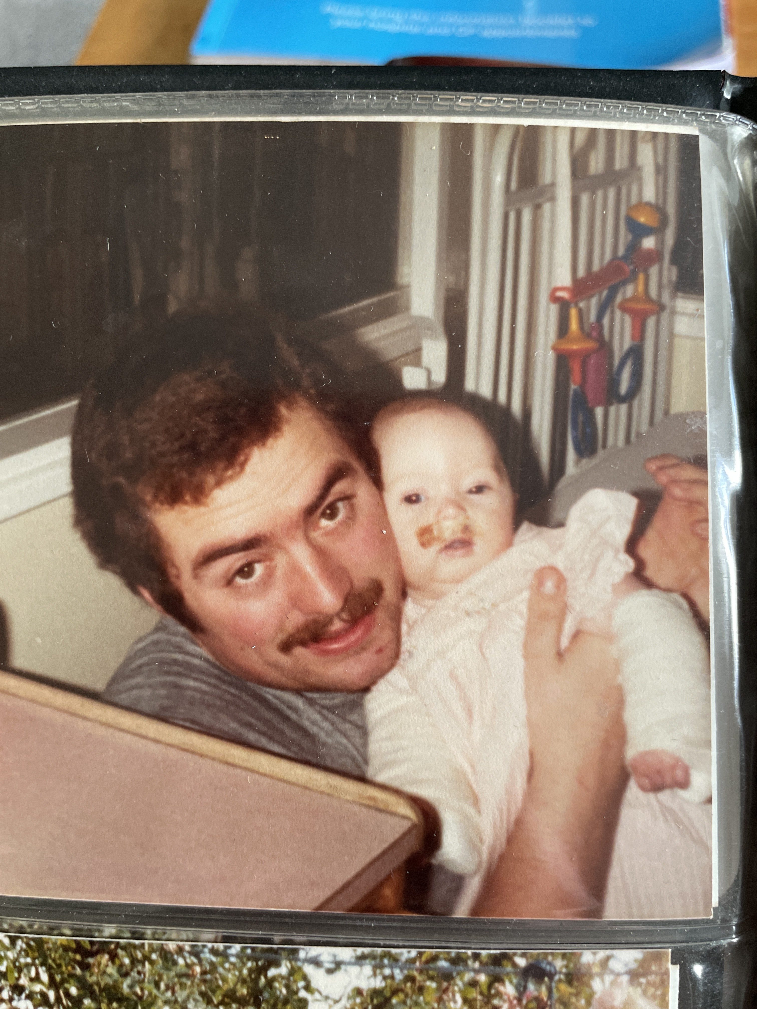 A photo of a man and a baby