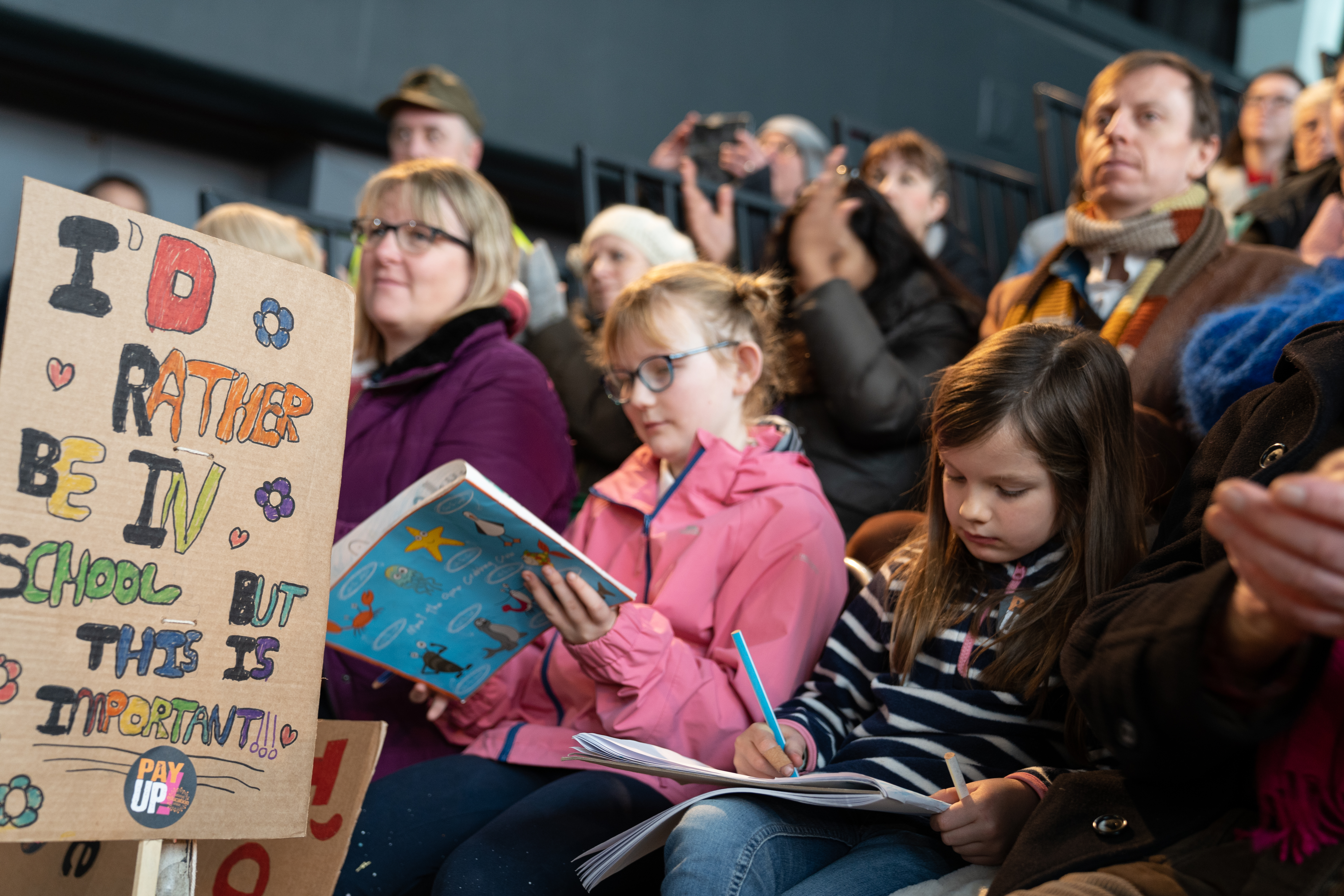 Children attend a rally in England