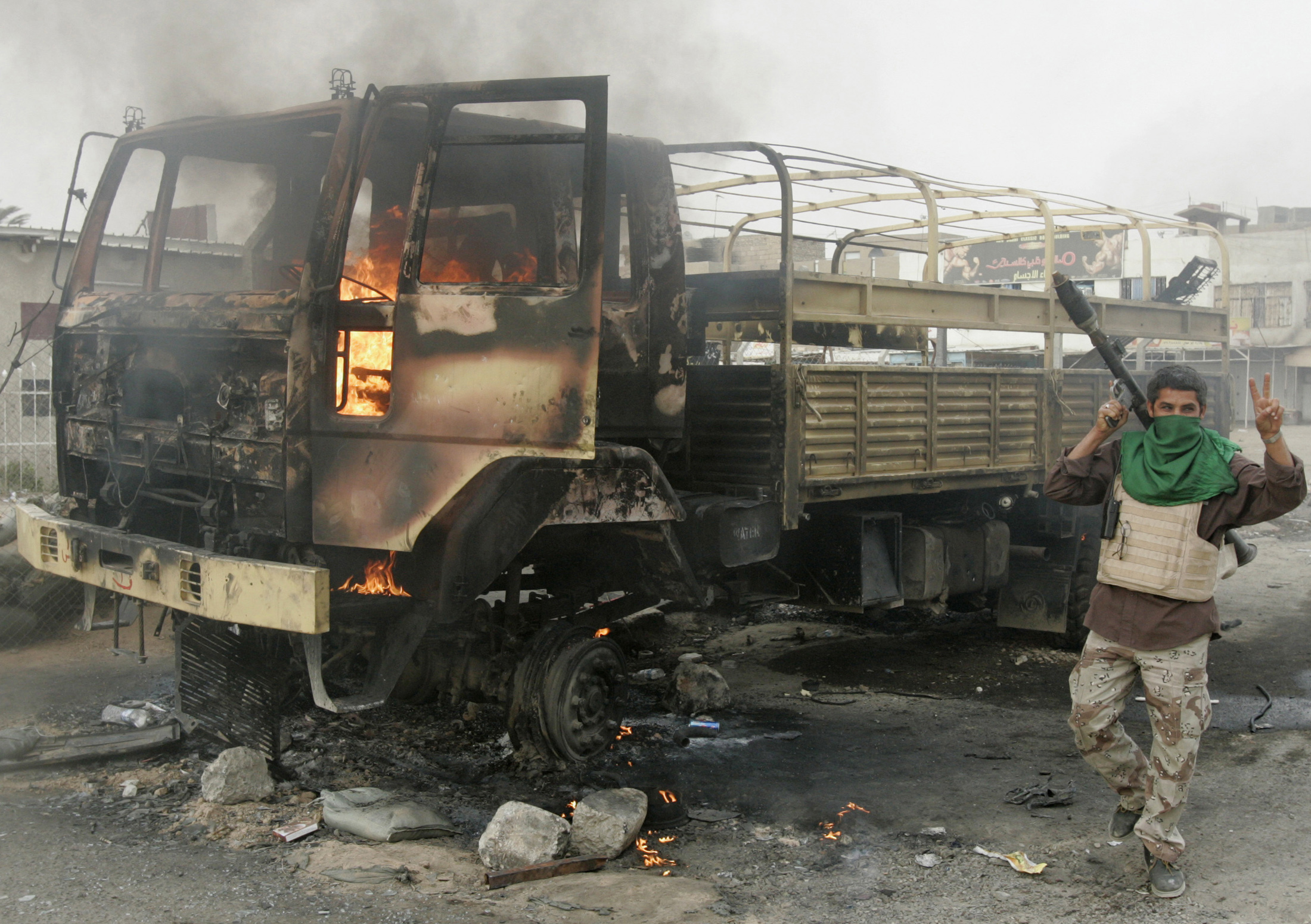 A Mahdi Army fighter holding a rocket-propelled grenade