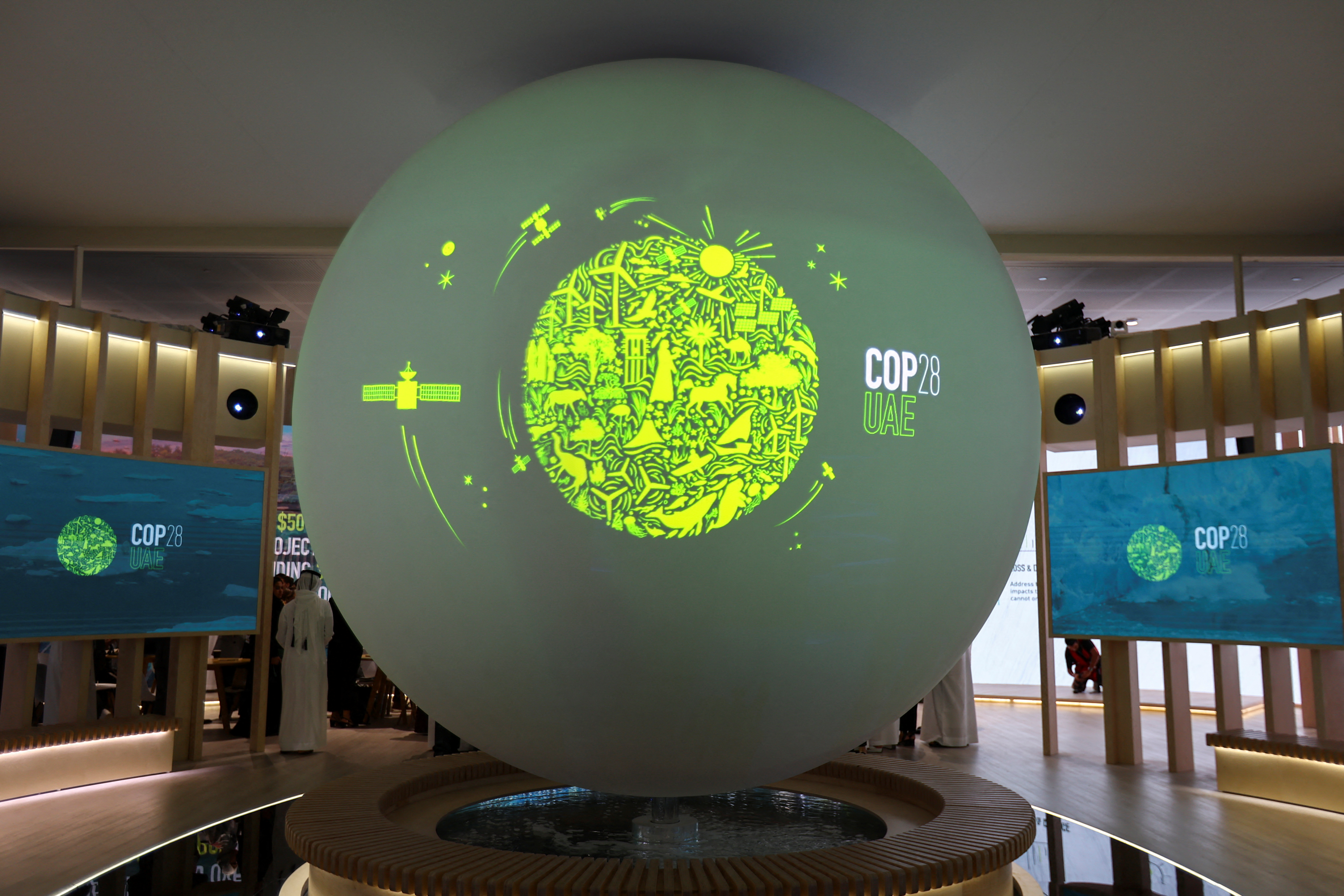 A view shows the 'Cop28 UAE' logo on a globe, during Abu Dhabi Sustainability Week (ADSW), in Abu Dhabi, UAE, January 17, 2023. REUTERS/Rula Rouhana