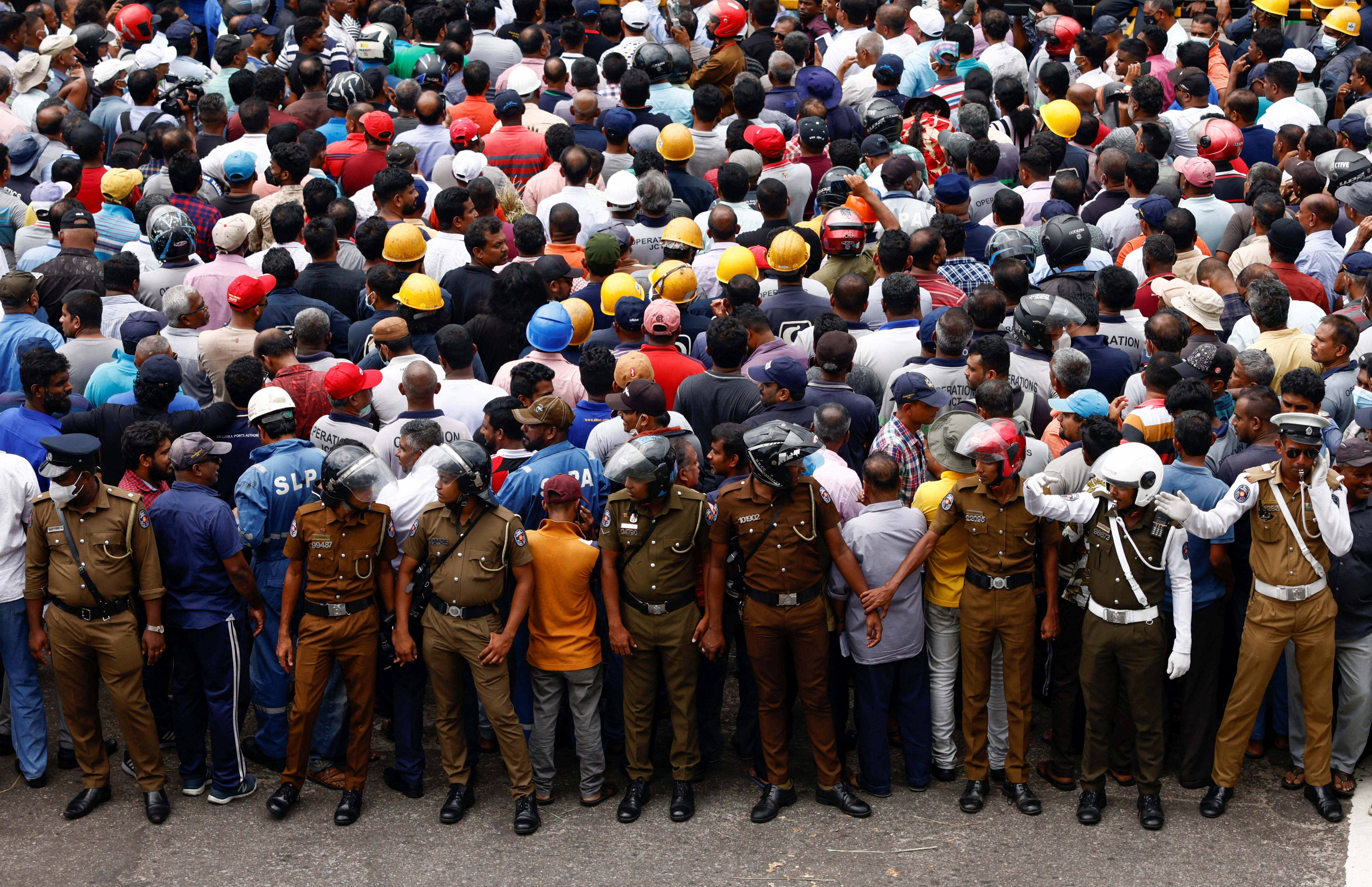 Colombo harbour union members protest during a strike against huge tax increase in Colombo