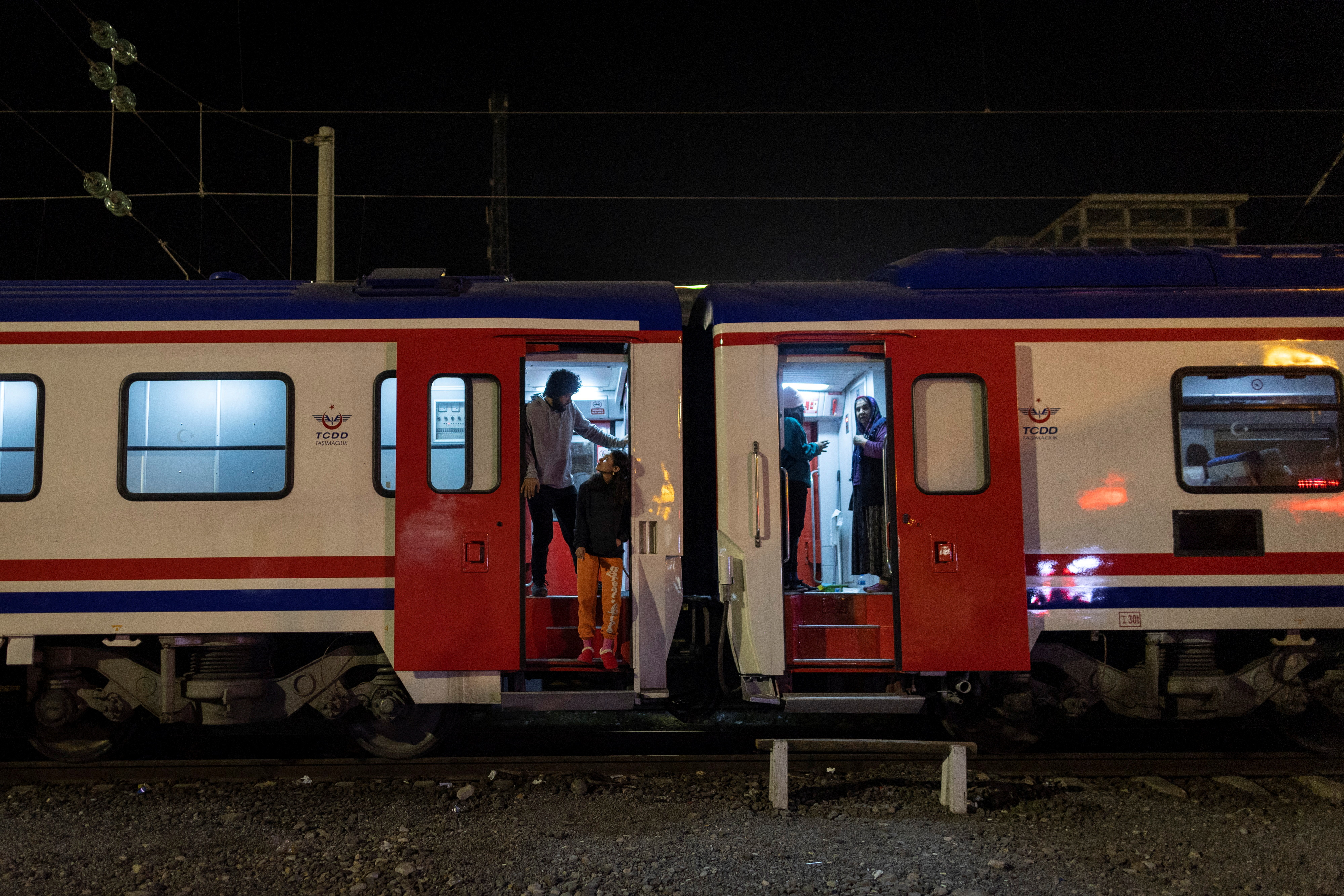 Turkish families shelter on a train after earthquake brought life to a standstill