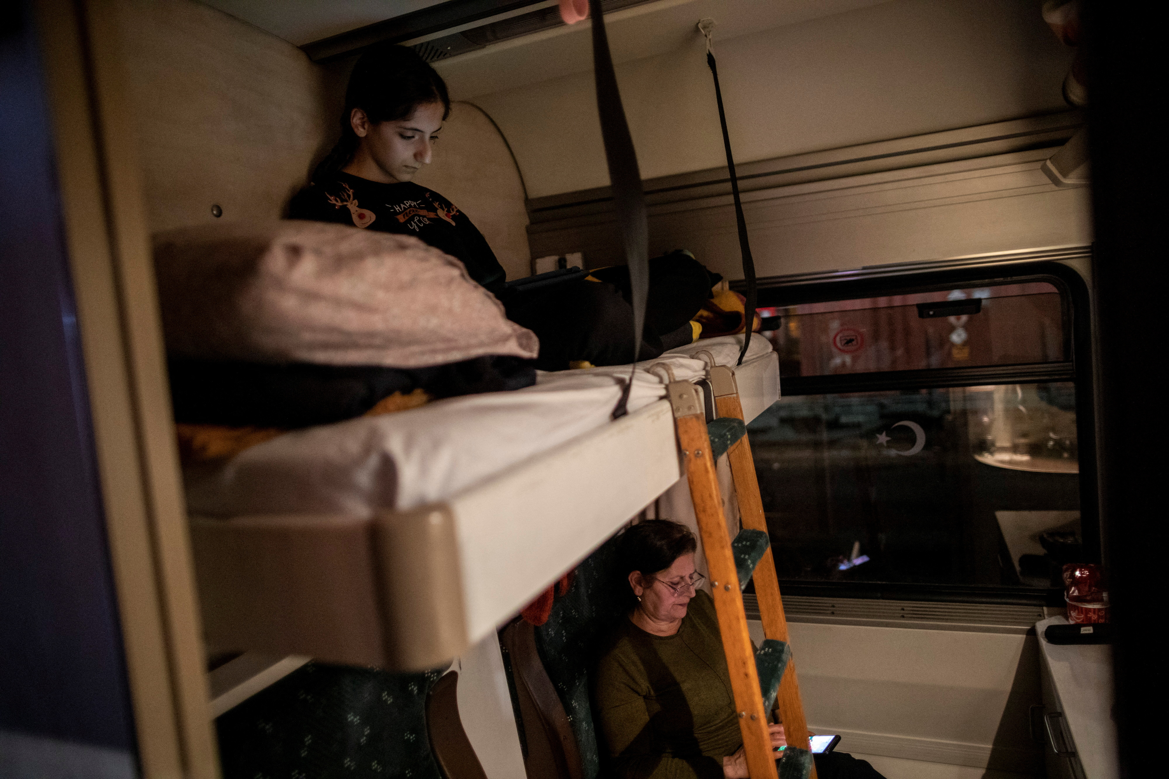 Turkish families shelter on a train after earthquake brought life to a standstill