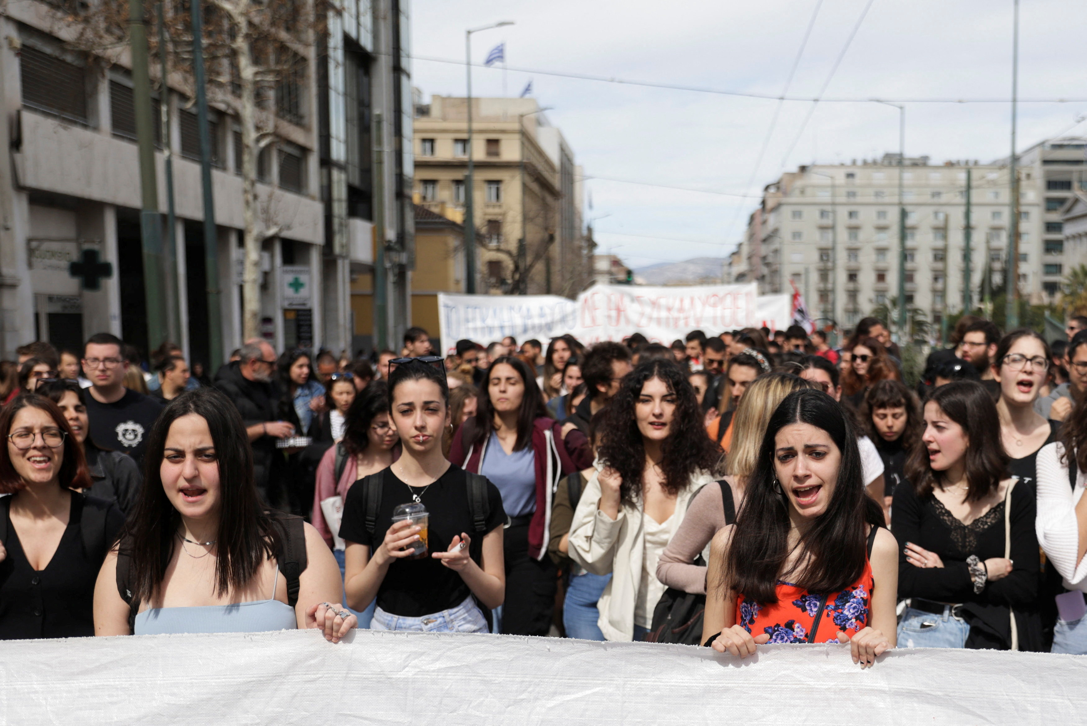 Protesters take part in a demonstration in front of the parliament building, following the fatal collision of two trains, in Athens, Greece, March 12, 2023. REUTERS/Louiza Vradi