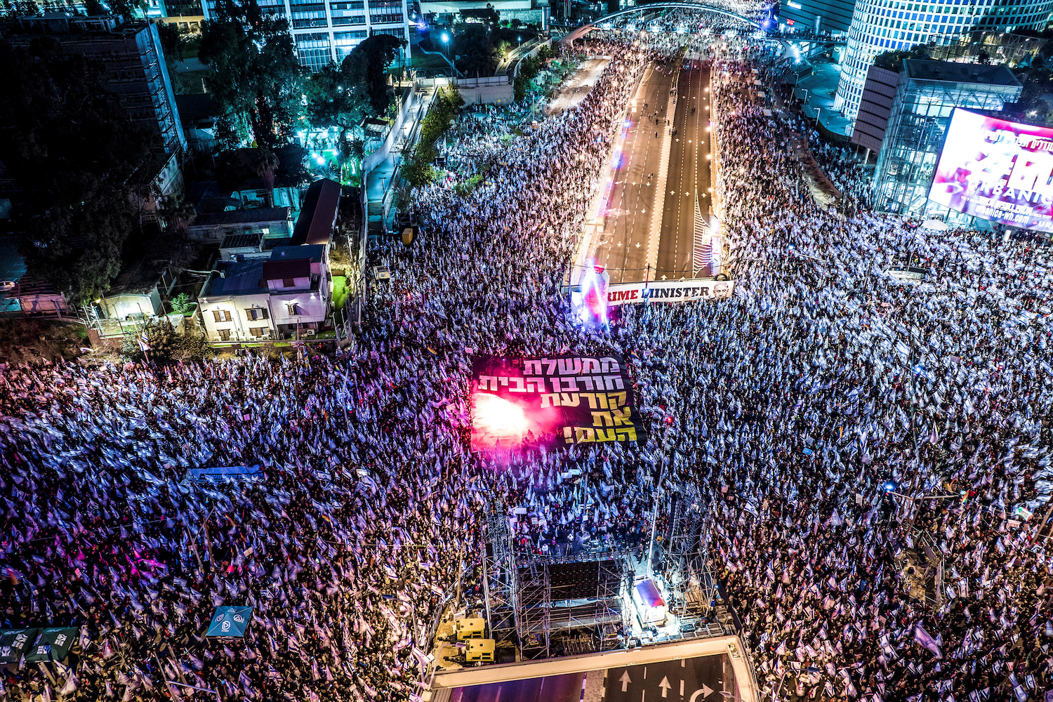An aerial view shows Israelis protesting, as Israeli Prime Minister Benjamin Netanyahu's nationalist coalition government presses on with its judicial overhaul, in Tel Aviv, Israel