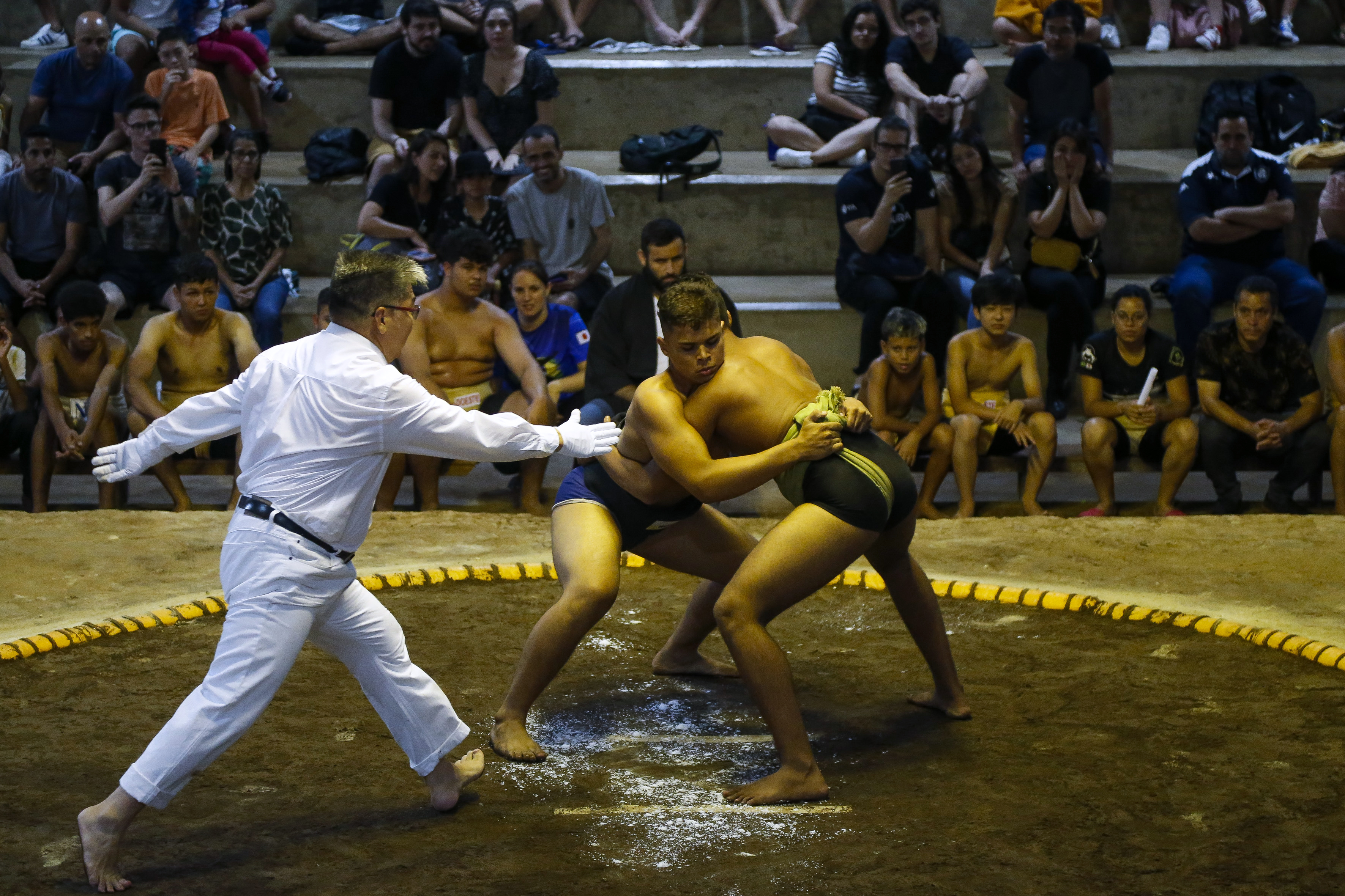 Sumo wrestlers fight during a Brazilian sumo championship bout, a qualifier for the South American championship, in Sao Paulo, Brazil