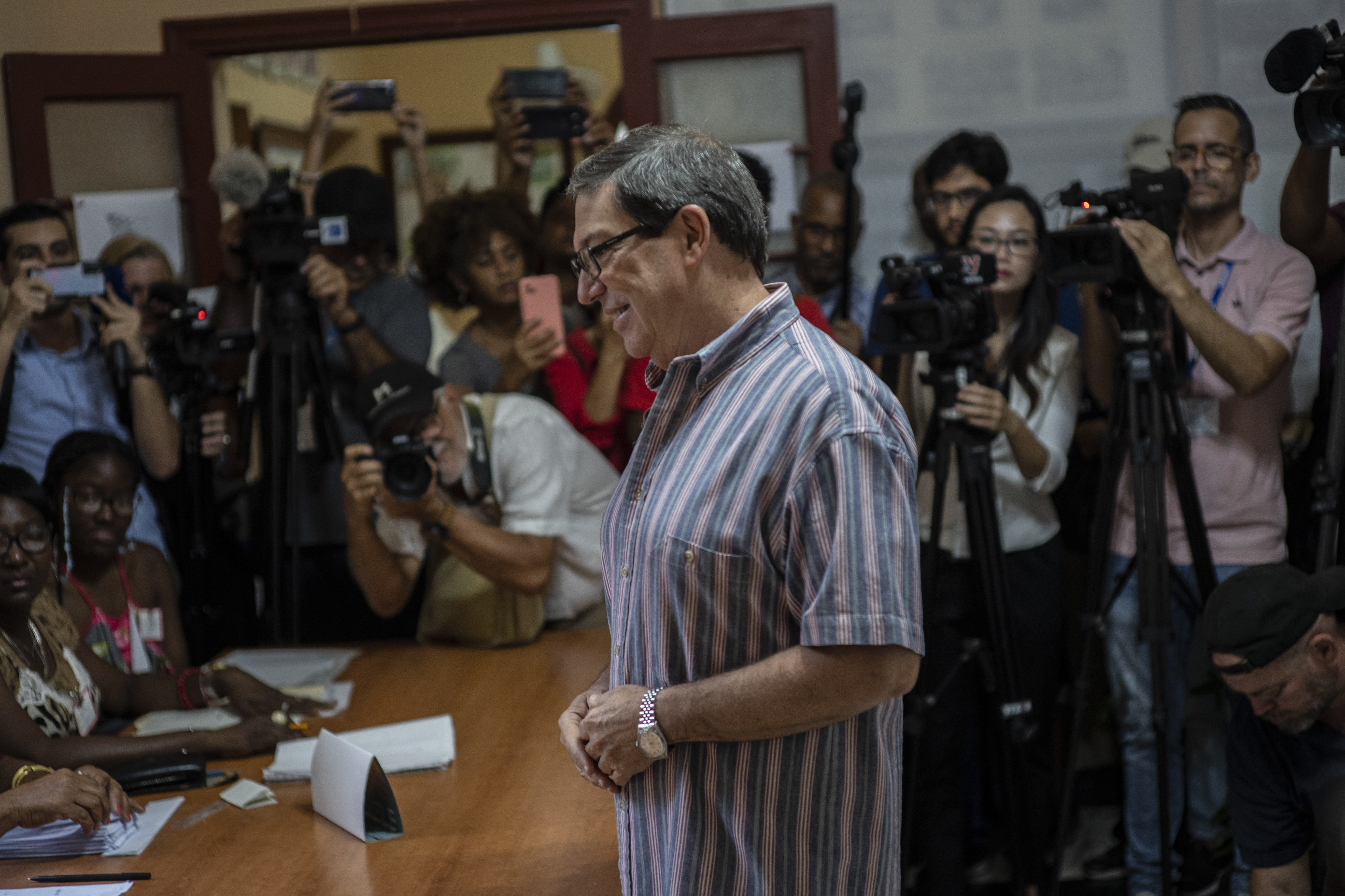 Cuba's Foreign Minister Bruno Rodriguez Parrilla prepares to vote at a polling station in Havana, Cuba, Sunday, March 26, 2023. 