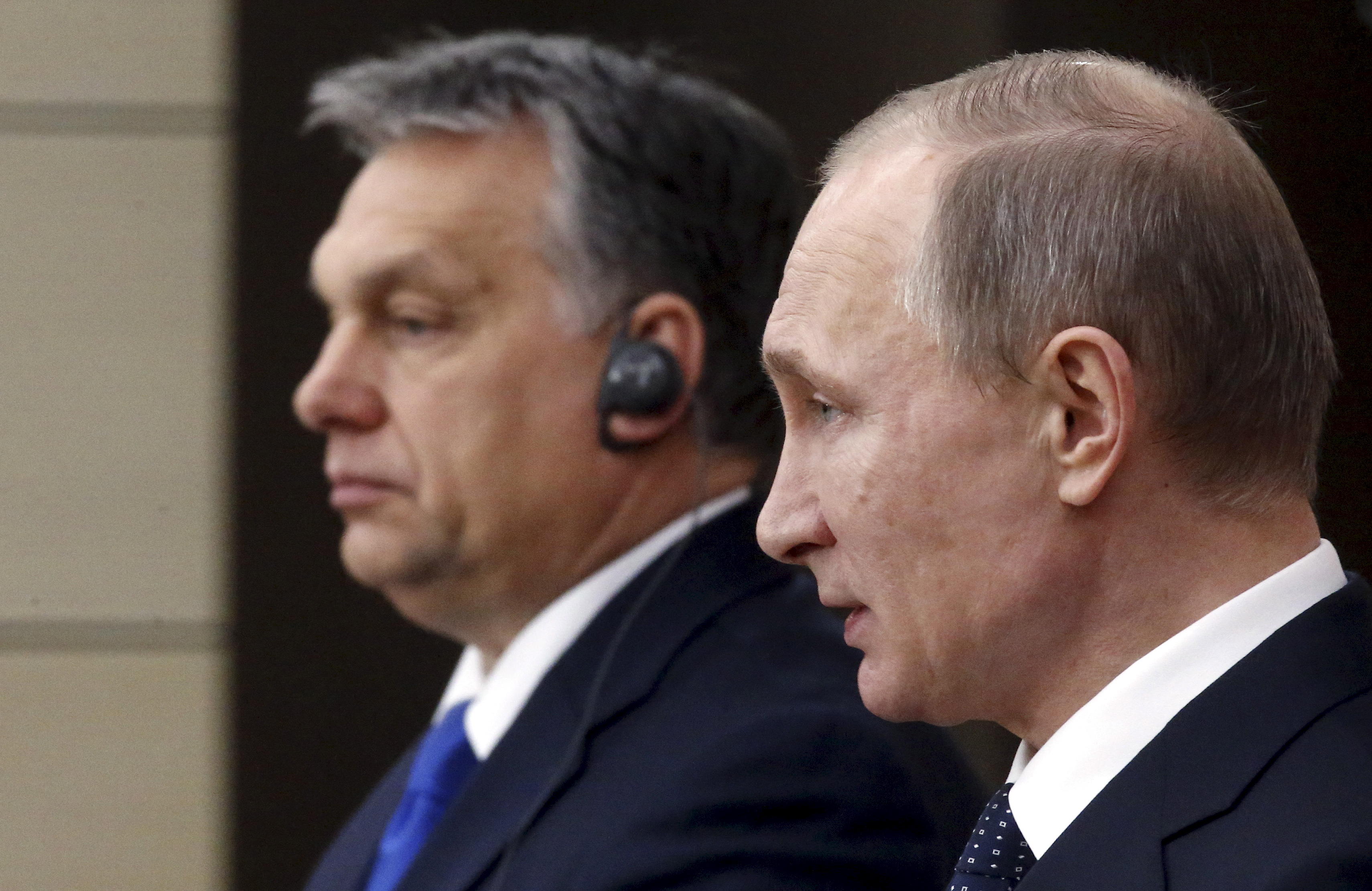 Russian President Vladimir Putin (R) and Hungarian Prime Minister Viktor Orban