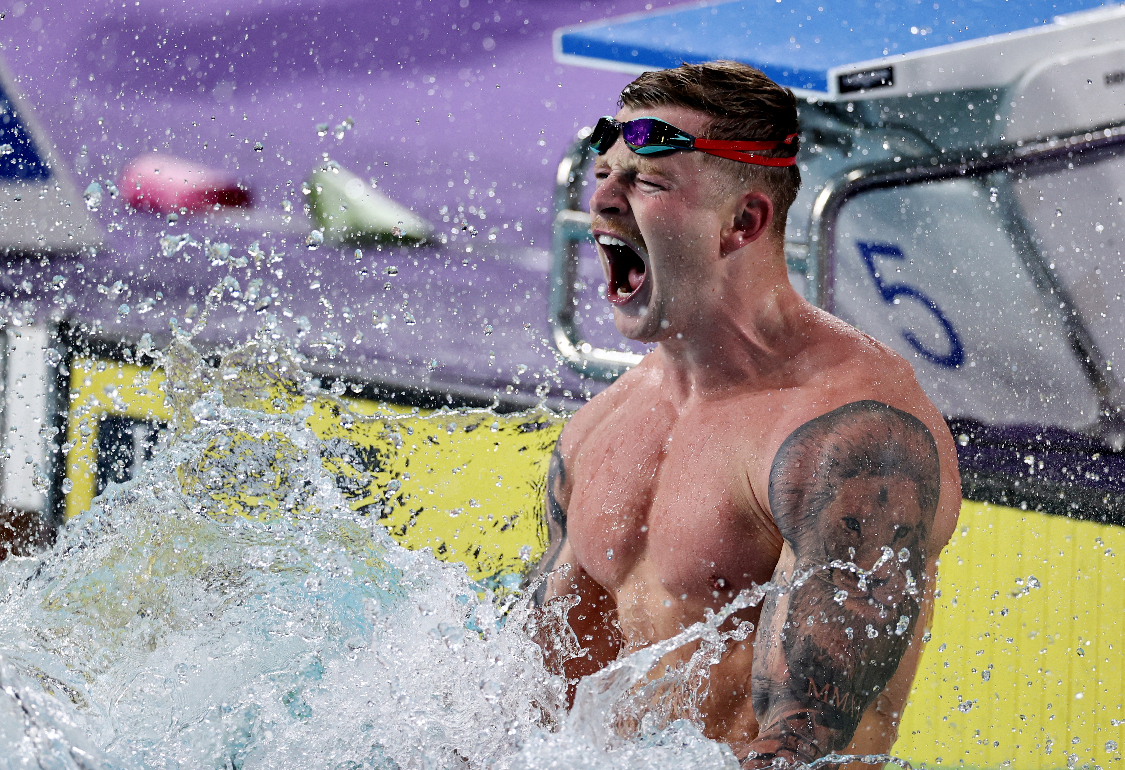 England's Adam Peaty celebrates after winning gold in the Commonwealth Games 50m breaststroke