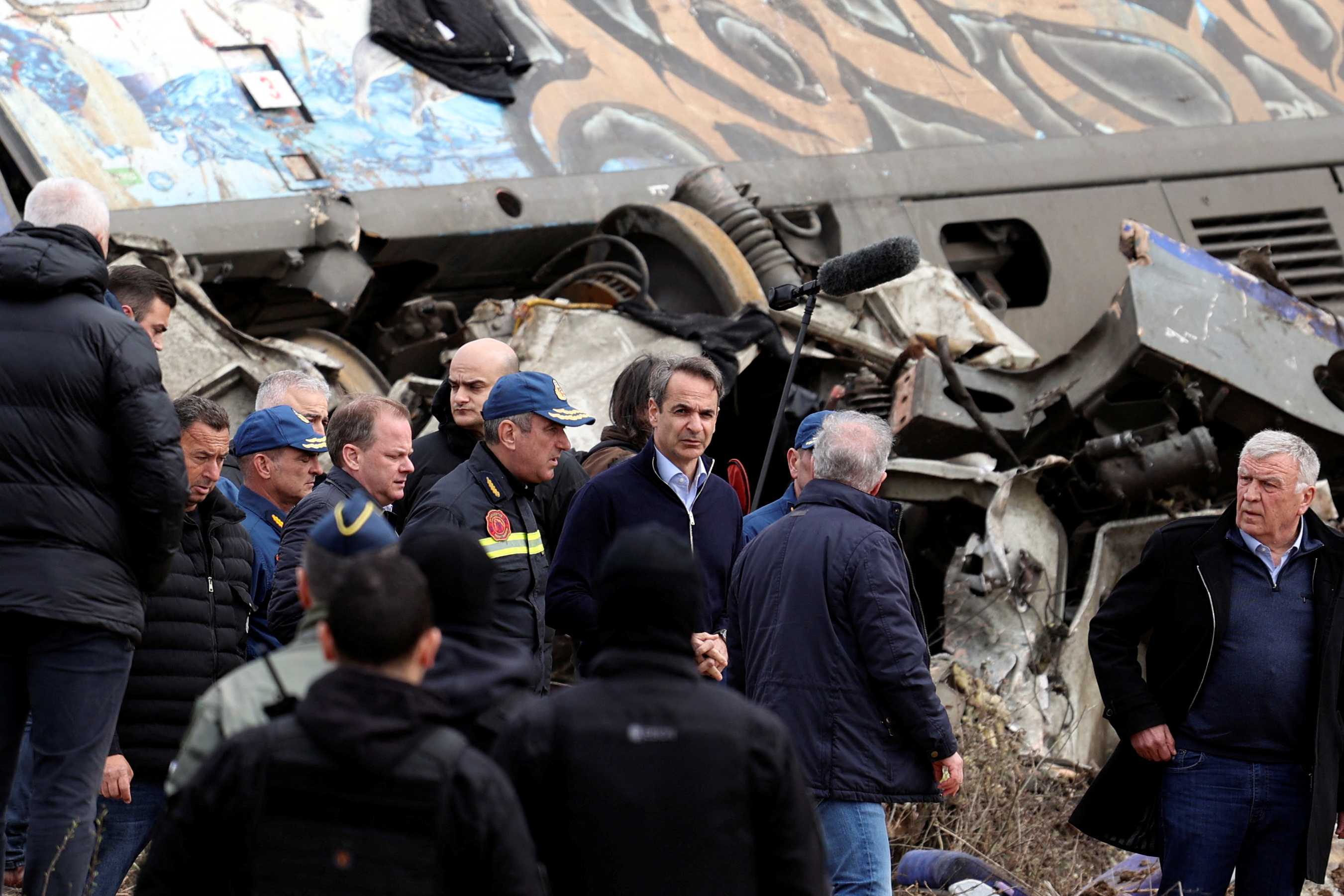 Greek Prime Minister Kyriakos Mitsotakis visits the site of a crash, where two trains collided, near the city of Larissa, Greece, March 1, 2023. REUTERS/Alexandros Avramidis