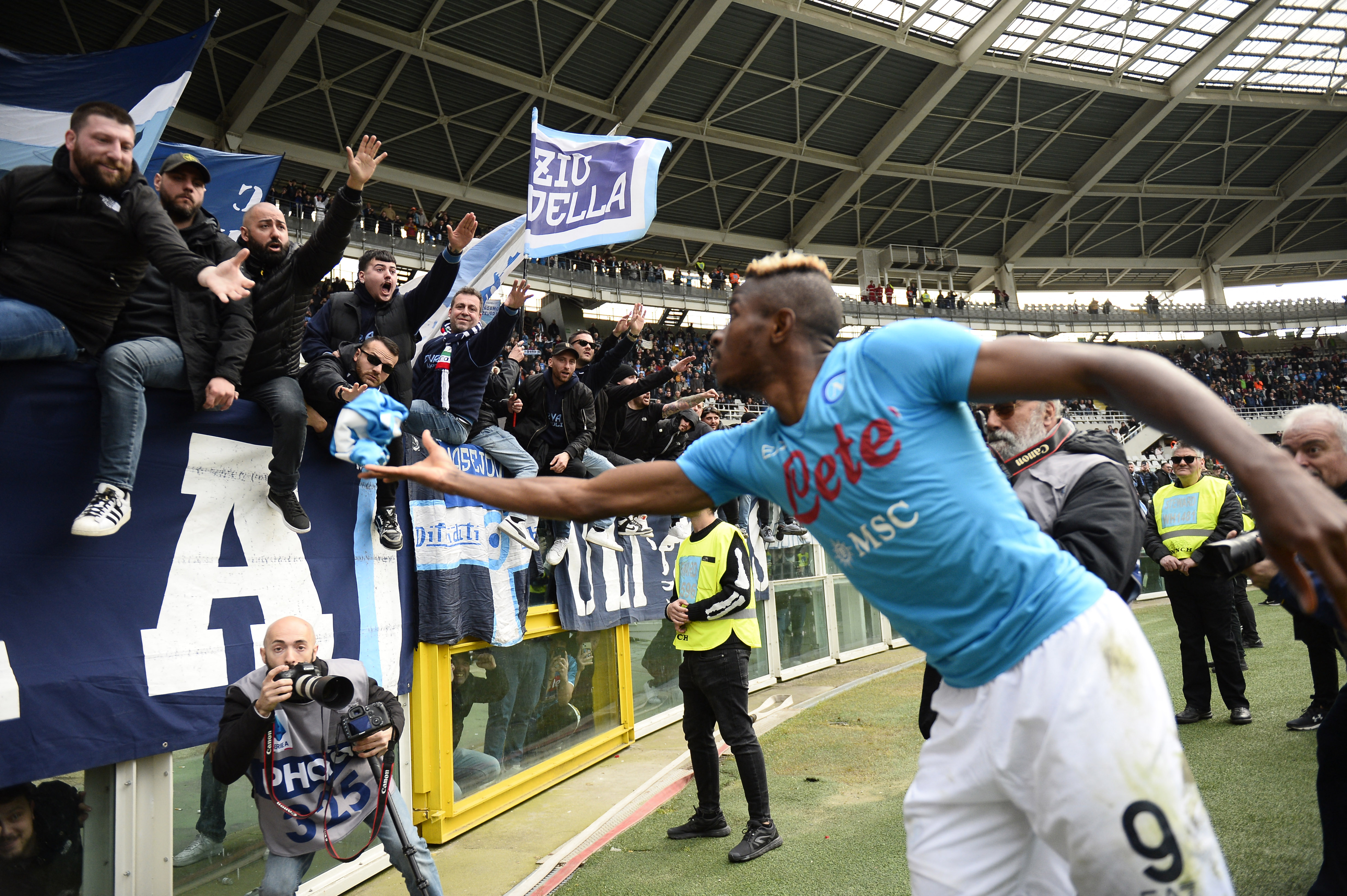 Osimhen celebrates with Napoli fans after a match