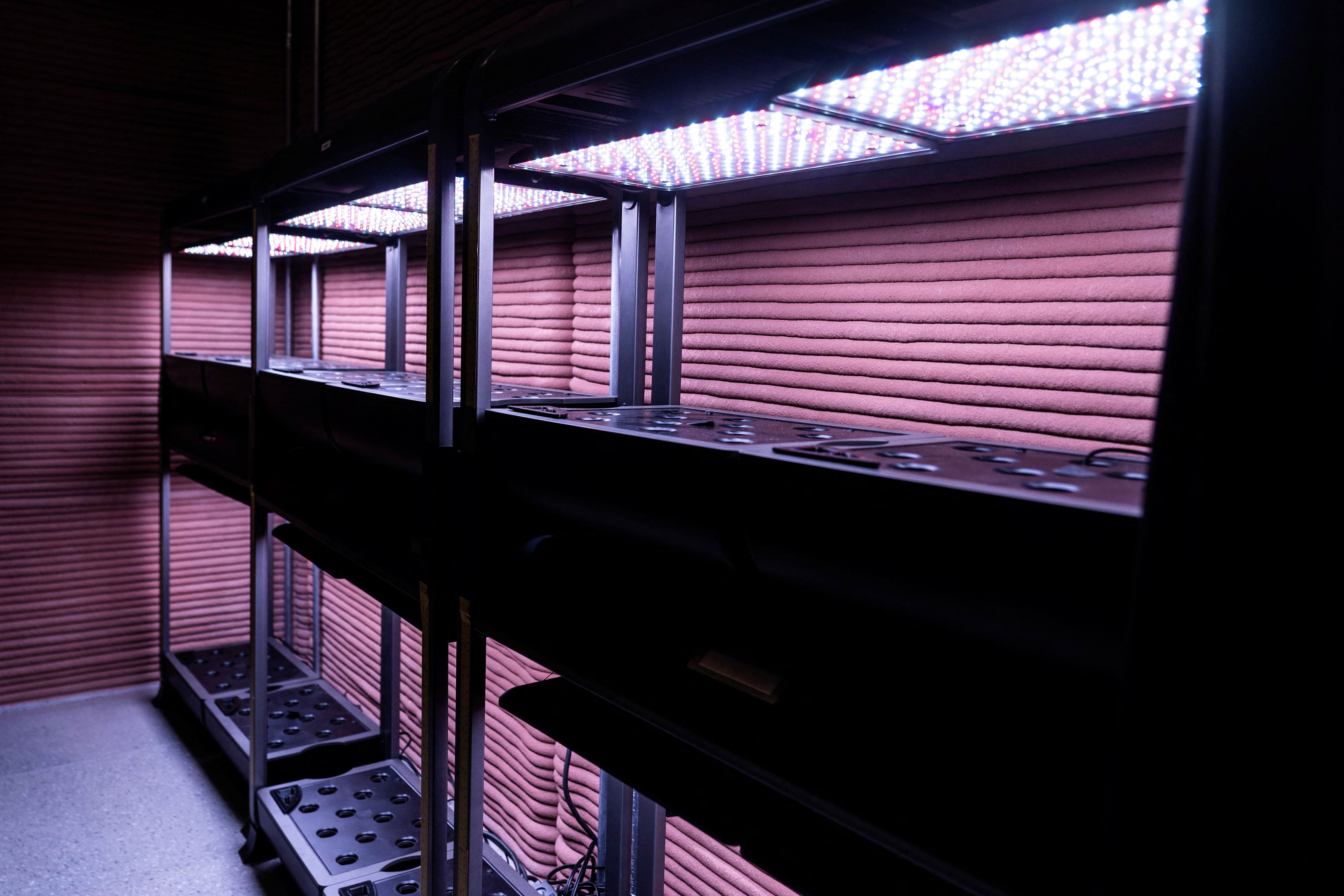 Plant pods to grow vegetables are seen inside the Mars Dune Alpha