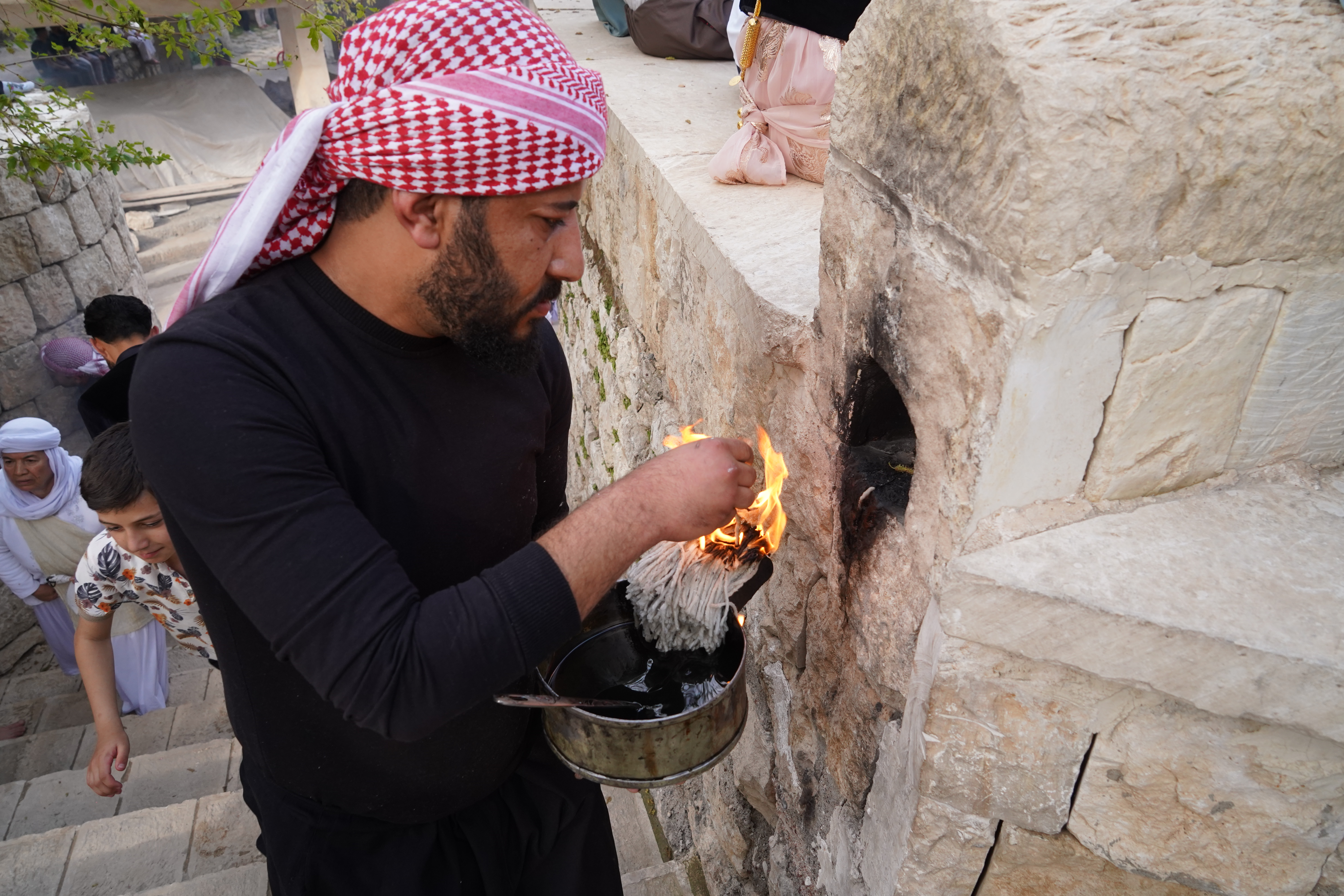 Yazidi New Year's Eve celebrations at Lalish Temple in the Kurdistan Region of Iraq [Ismael Adnan/Al Jazeera]