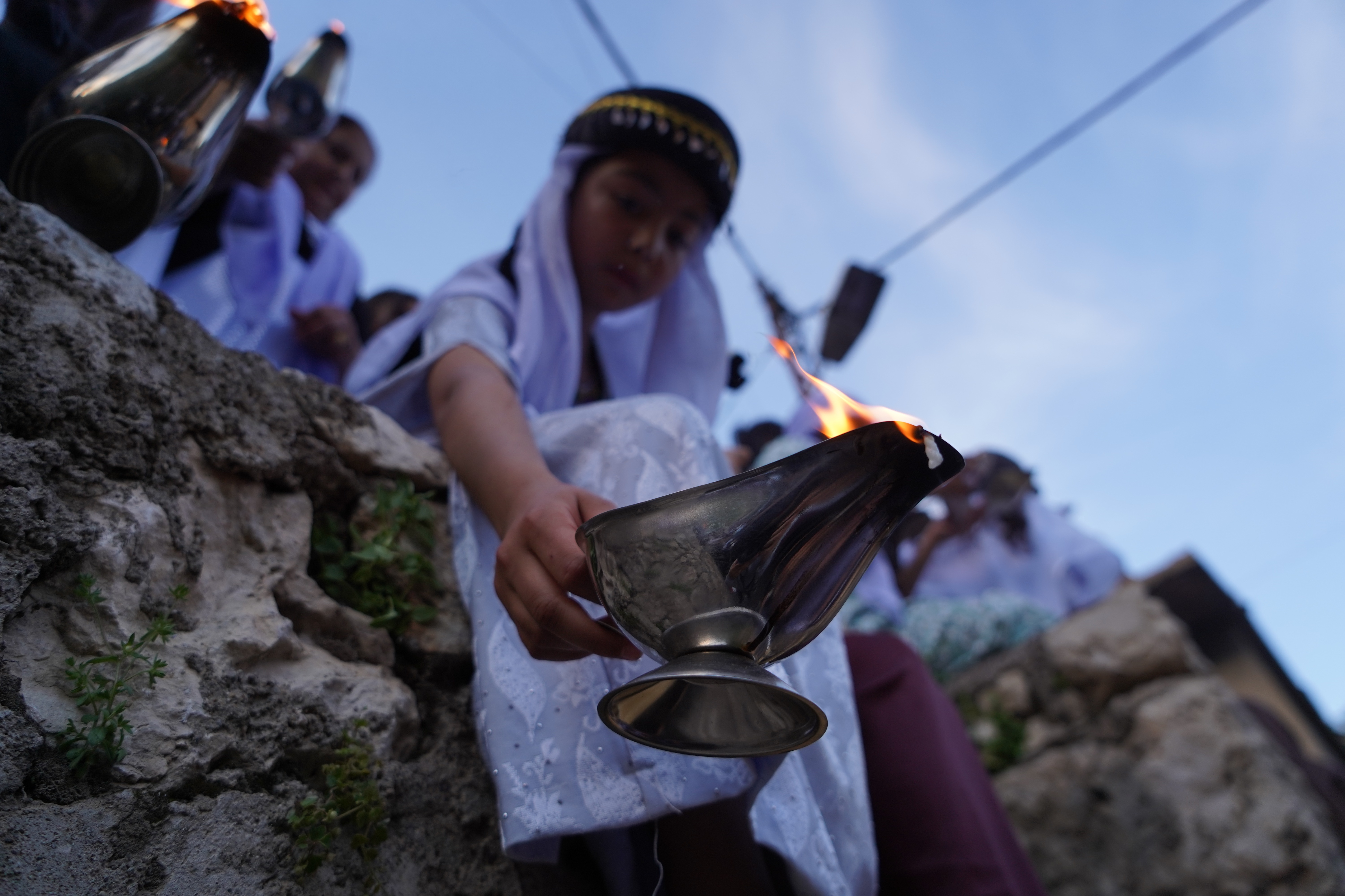 Yazidi New Year's Eve celebrations at Lalish Temple in the Kurdistan Region of Iraq [Ismael Adnan/Al Jazeera]